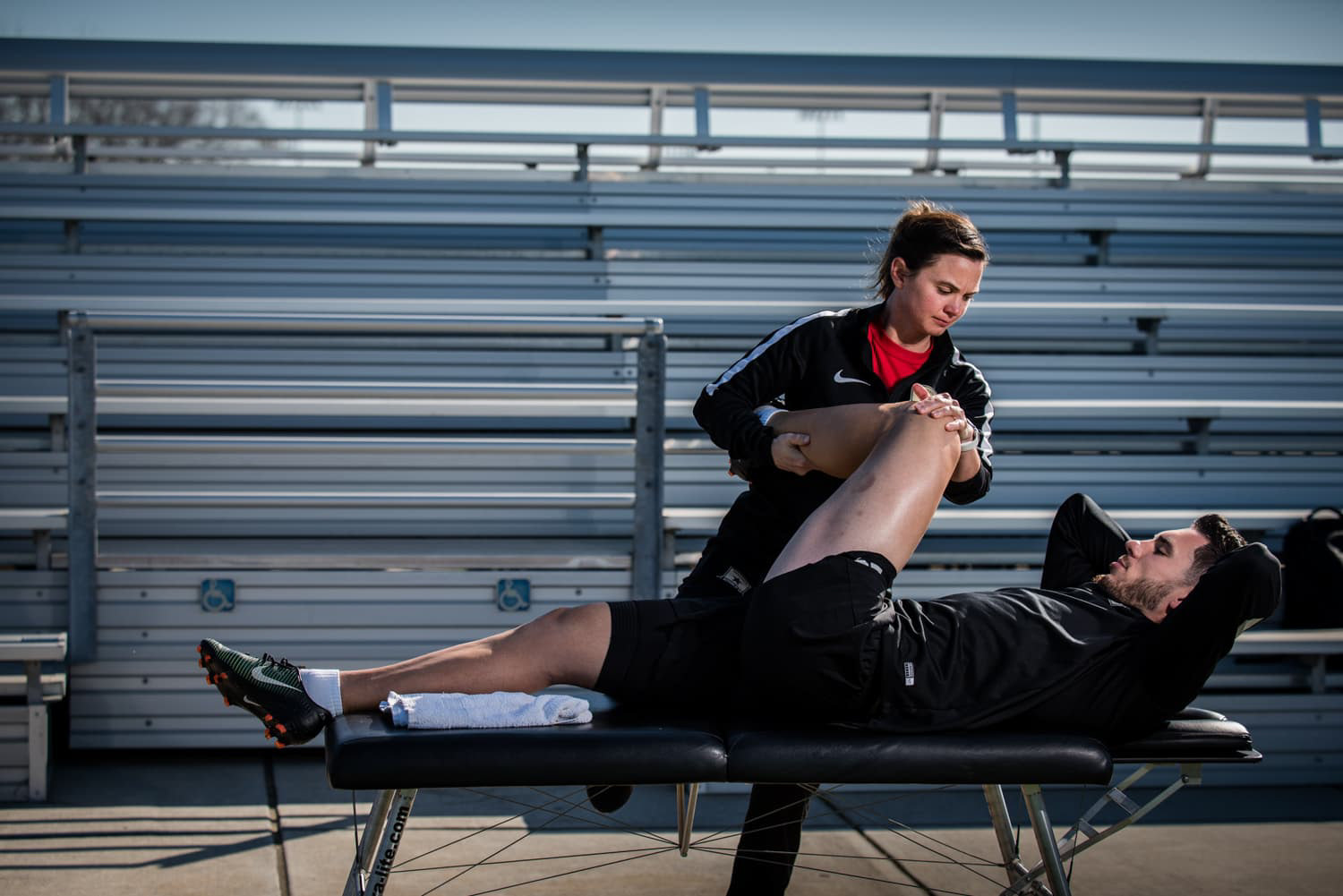 Katy Norton Physical Therapist Sacramento Republic Football Club working on Emrah Kilmenta