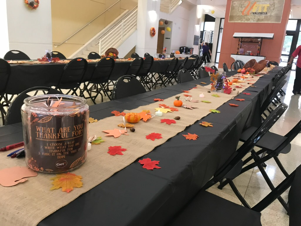 Coordinated Thanksgiving Dinner branding and décor to create a welcoming atmosphere.