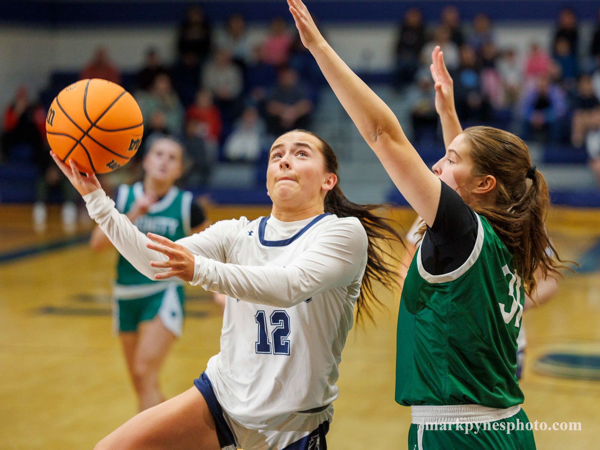 Cecilia Battisti, Camp Hill, drives on Trinity’s Aryana McCleary but Trinity wins, 61-16, in Camp Hill, Pa., Dec. 9, 2025.