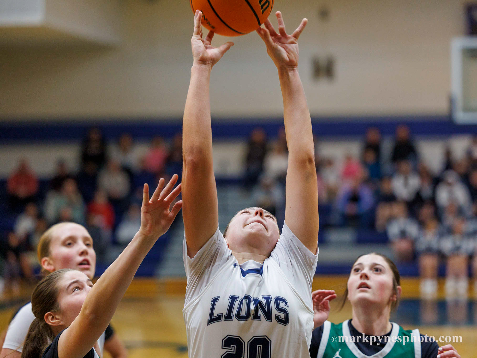 Lindsay Johnson, Camp Hill, grabs a rebound but Trinity prevails, 61-16, in Camp Hill, Pa., Dec. 9, 2025.
