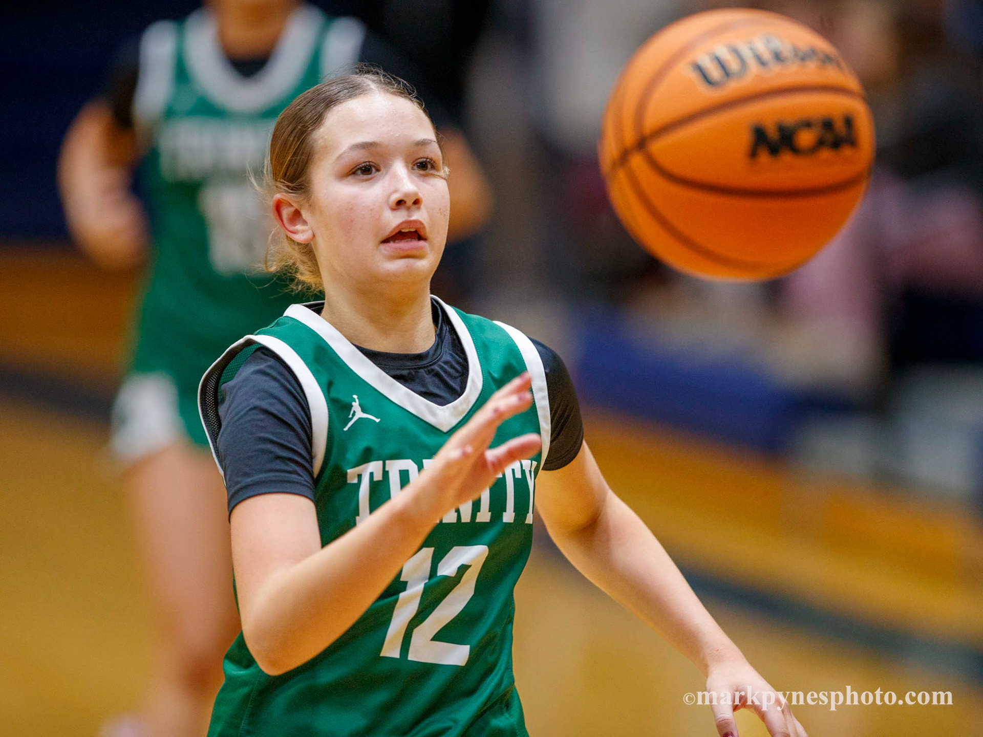 Trinity’s Kendall Colgate chases a loose ball. Trinity 61, Camp Hill 16, in Camp Hill, Pa., Dec. 9, 2025.