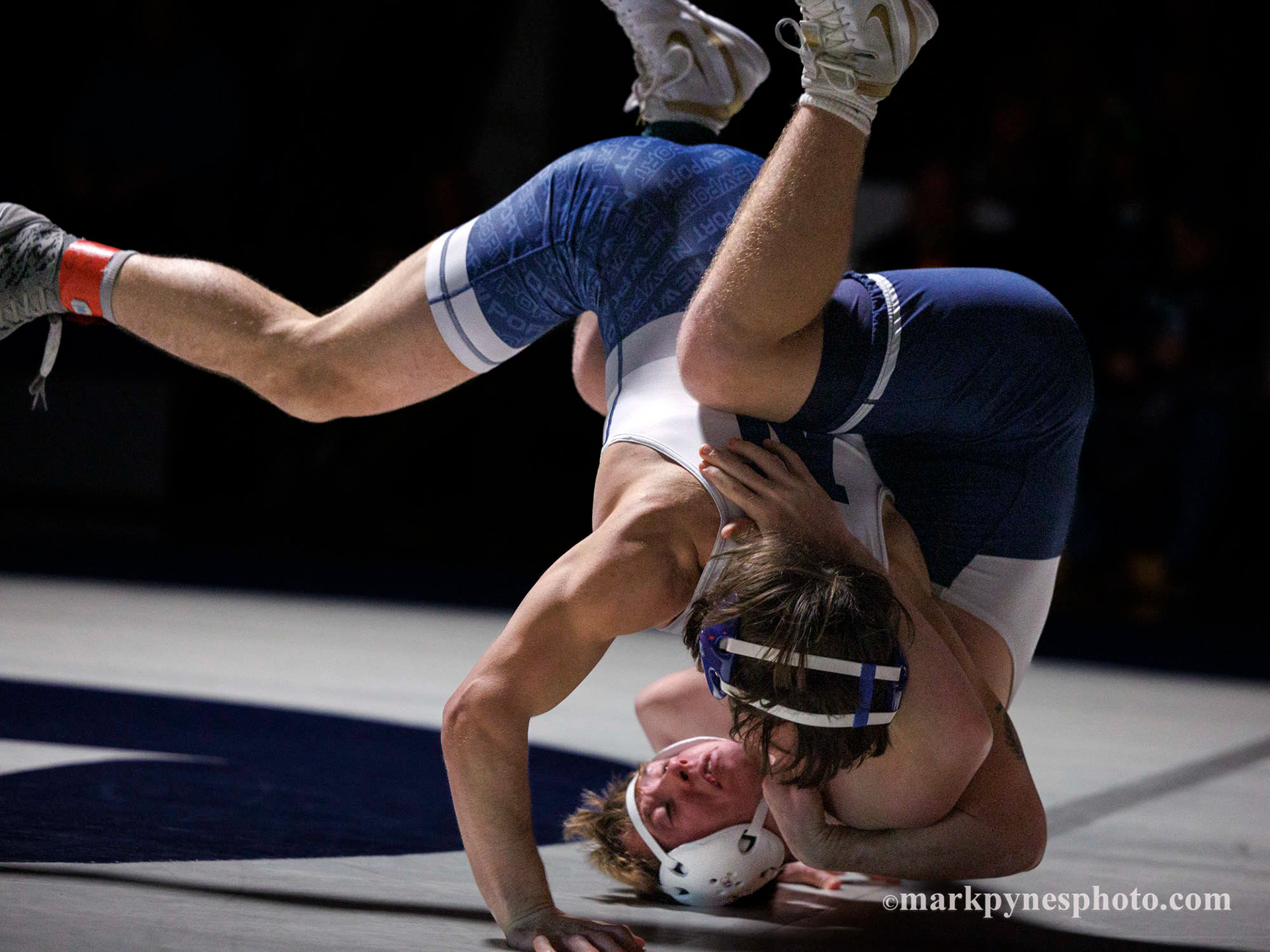 Newports Lane Wright and Camp Hill’s Evan Vogel, right, tie up in the 152 pound match, won in a fall by Wright.