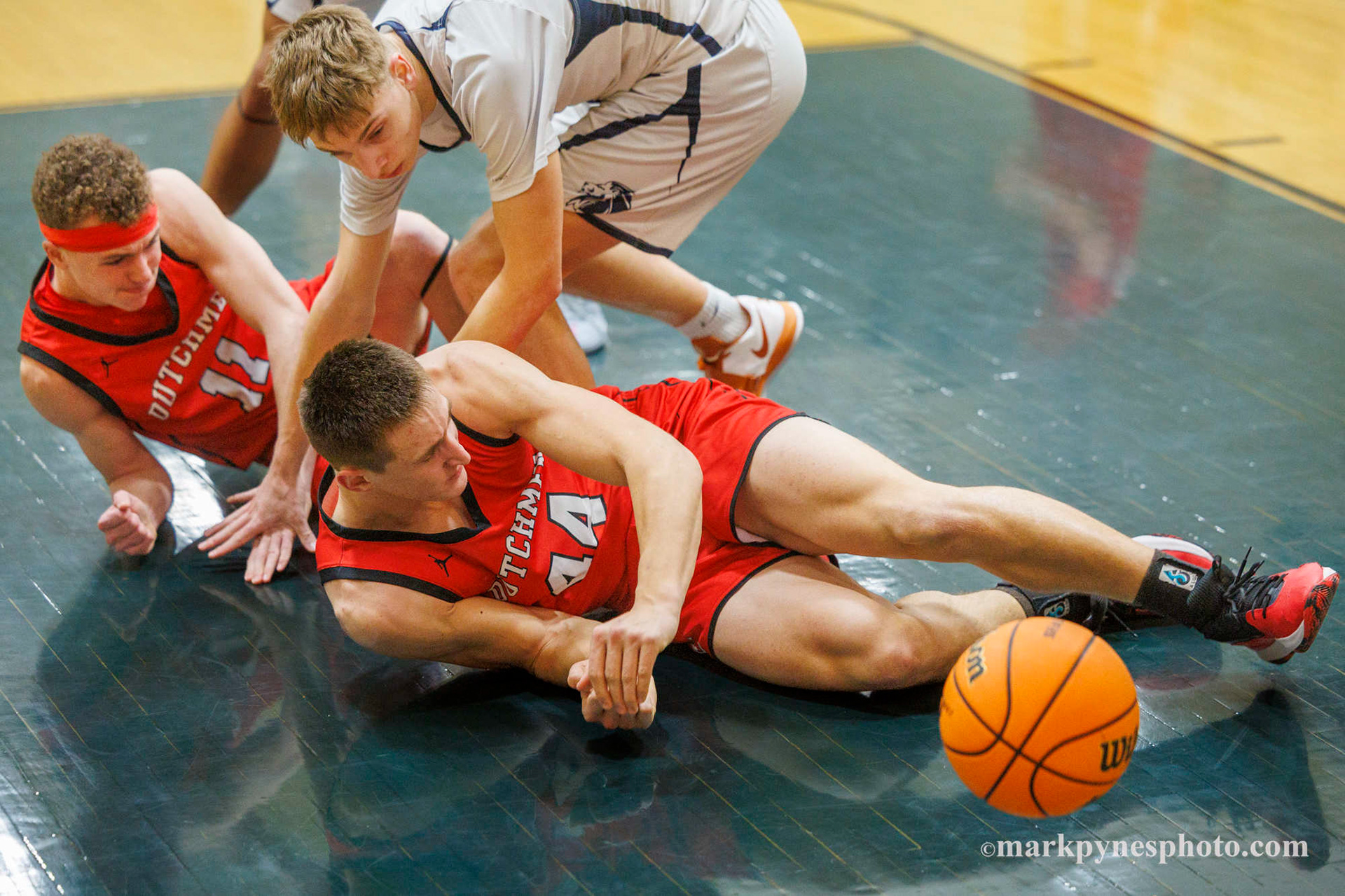 Annville-Cleona defenders Levi Custer and Hudson Sellers tussle with Owen Grove for a loose ball.
