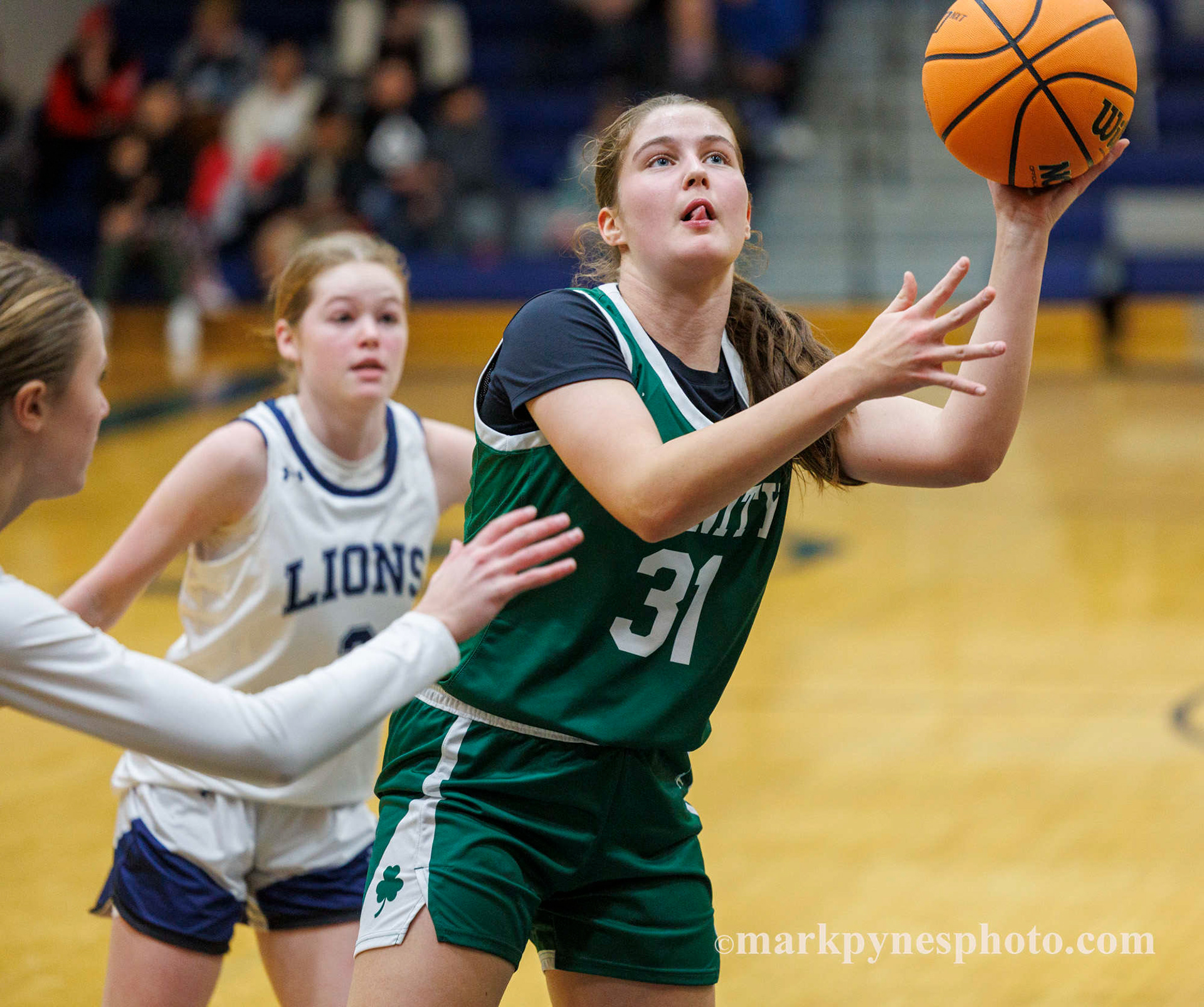 Aryana McCleary shoots. Final score, Trinity 61, Camp Hill 16, in Camp Hill, Pa., Dec. 9, 2025.