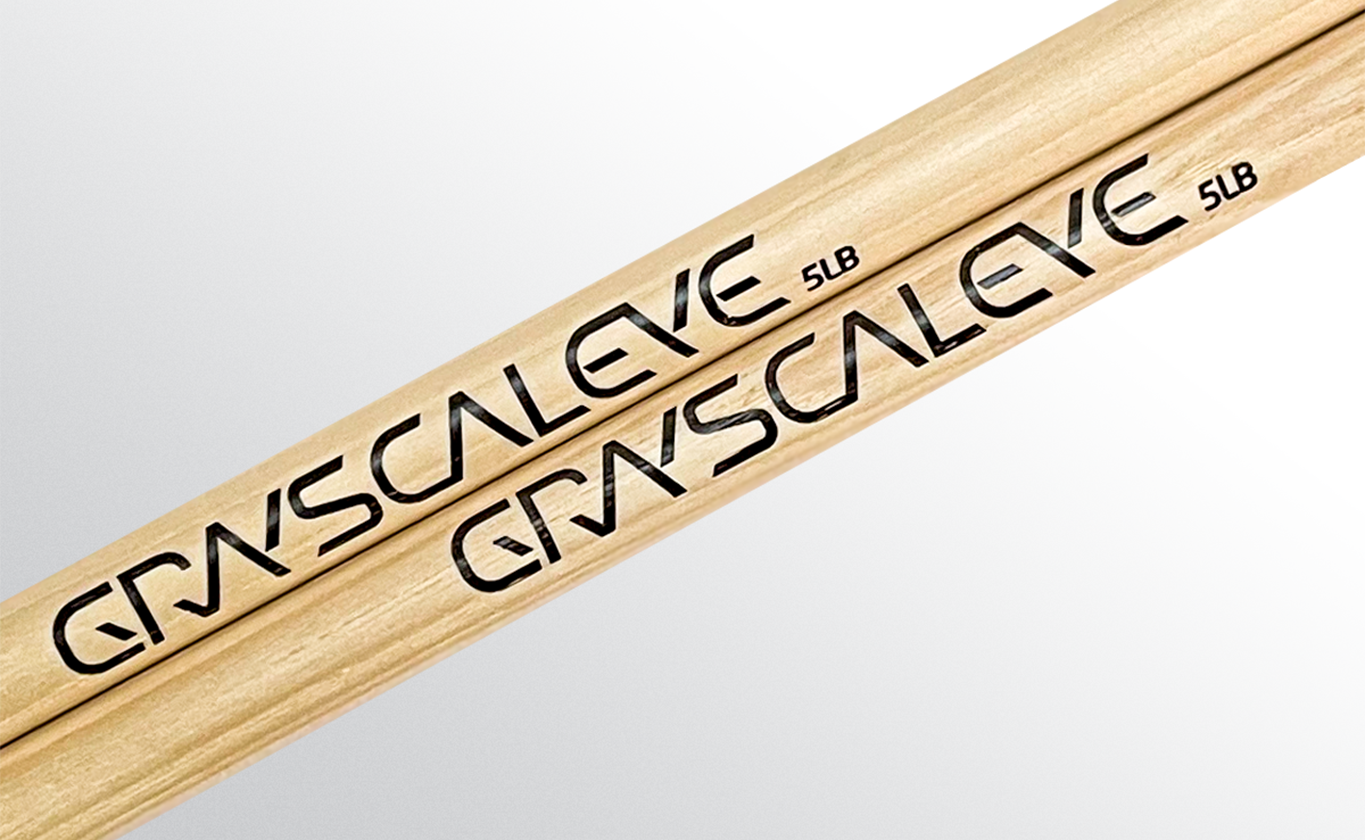 grayscaleye logo on drumstick macro