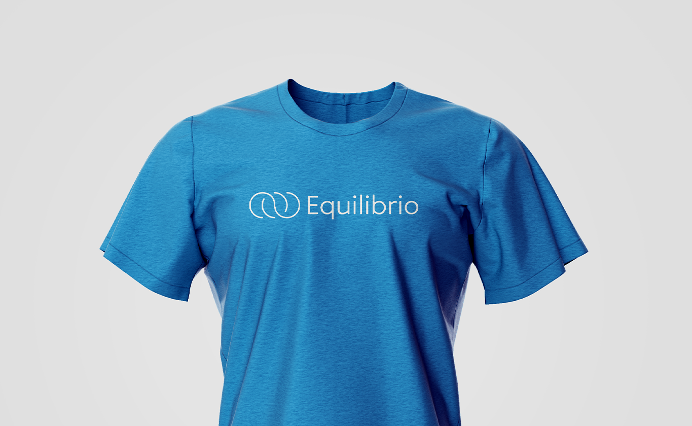equilibrio trento logo on blue tshirt 