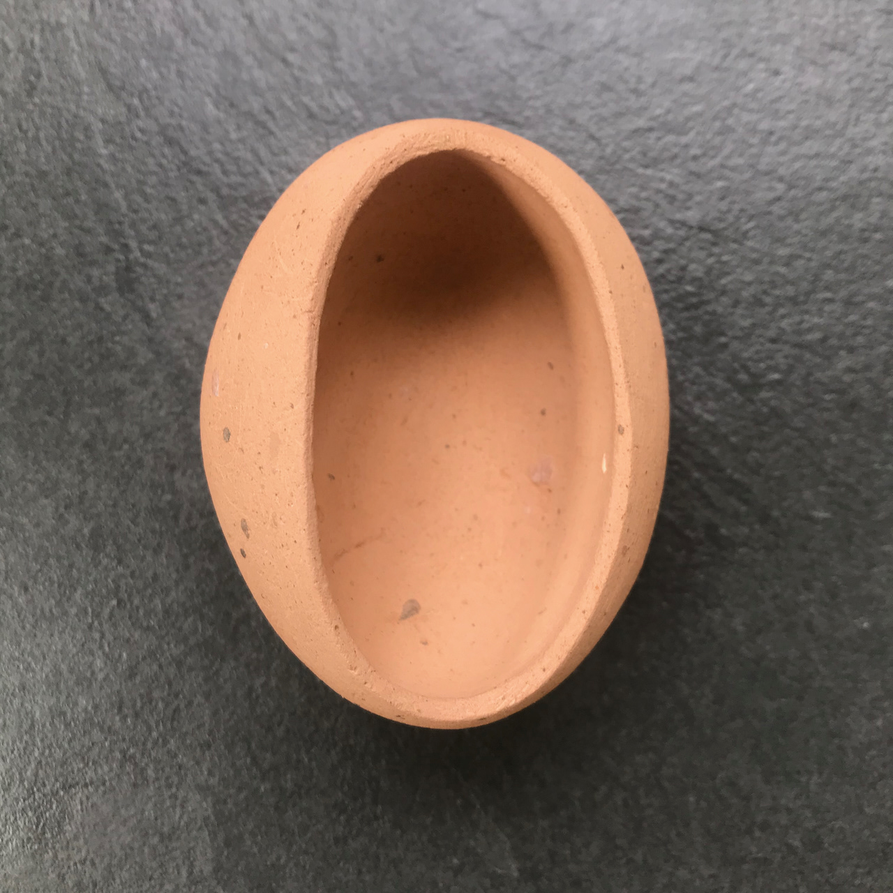 wood-fired pot on slate