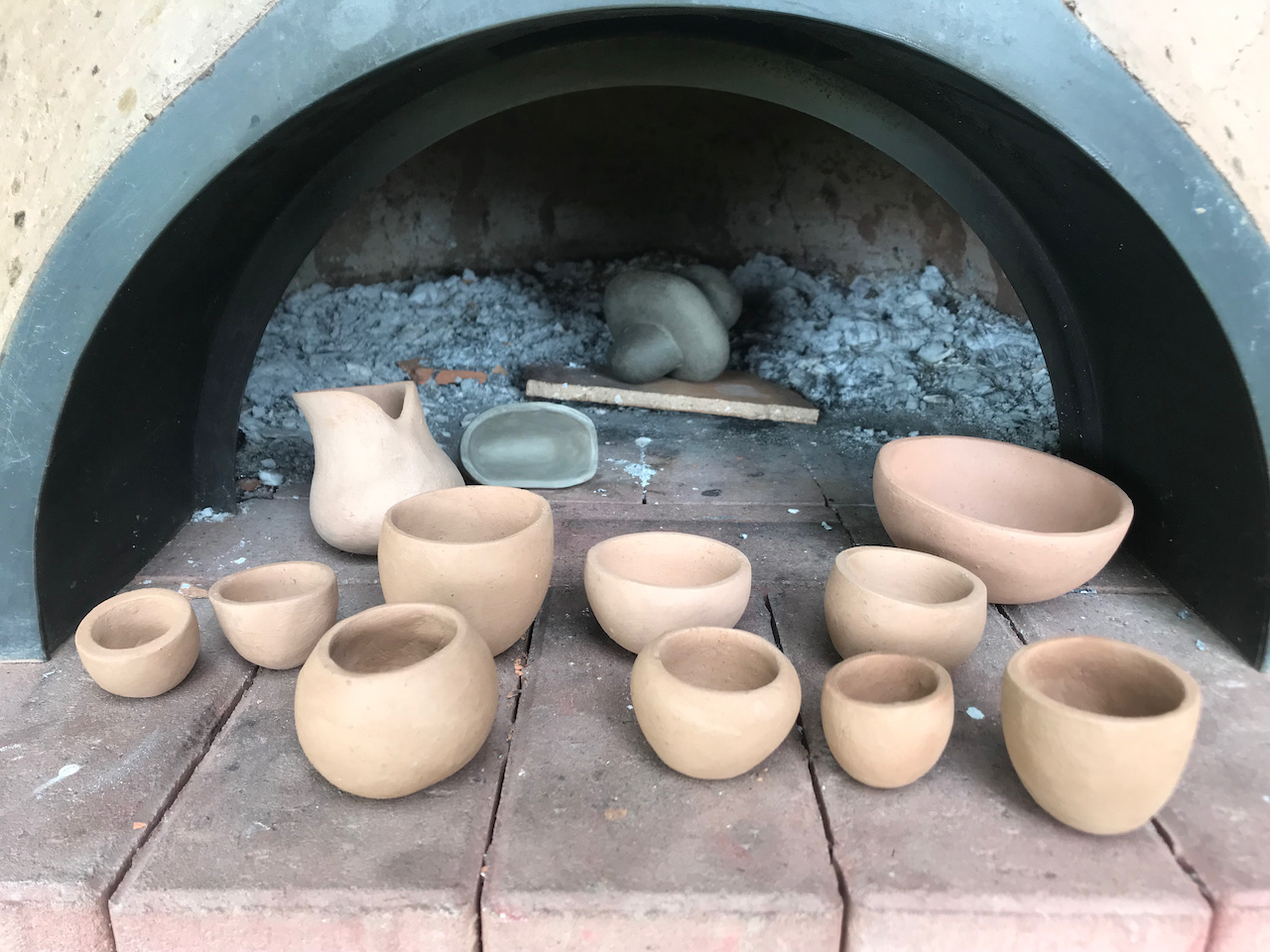 refined pinch pots ready to be fired