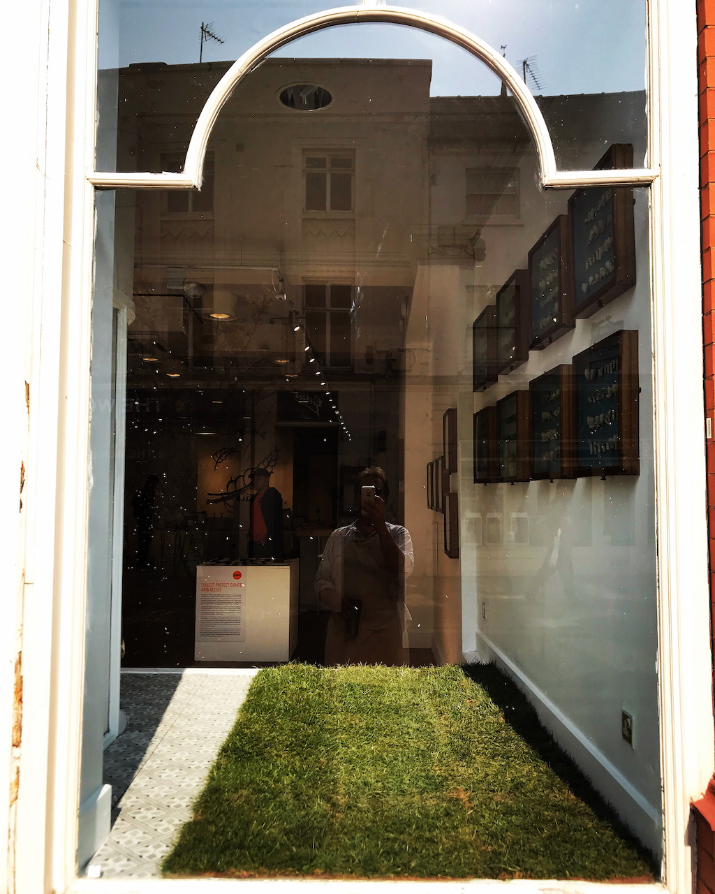 Window dressed with turf ready for pinch pots