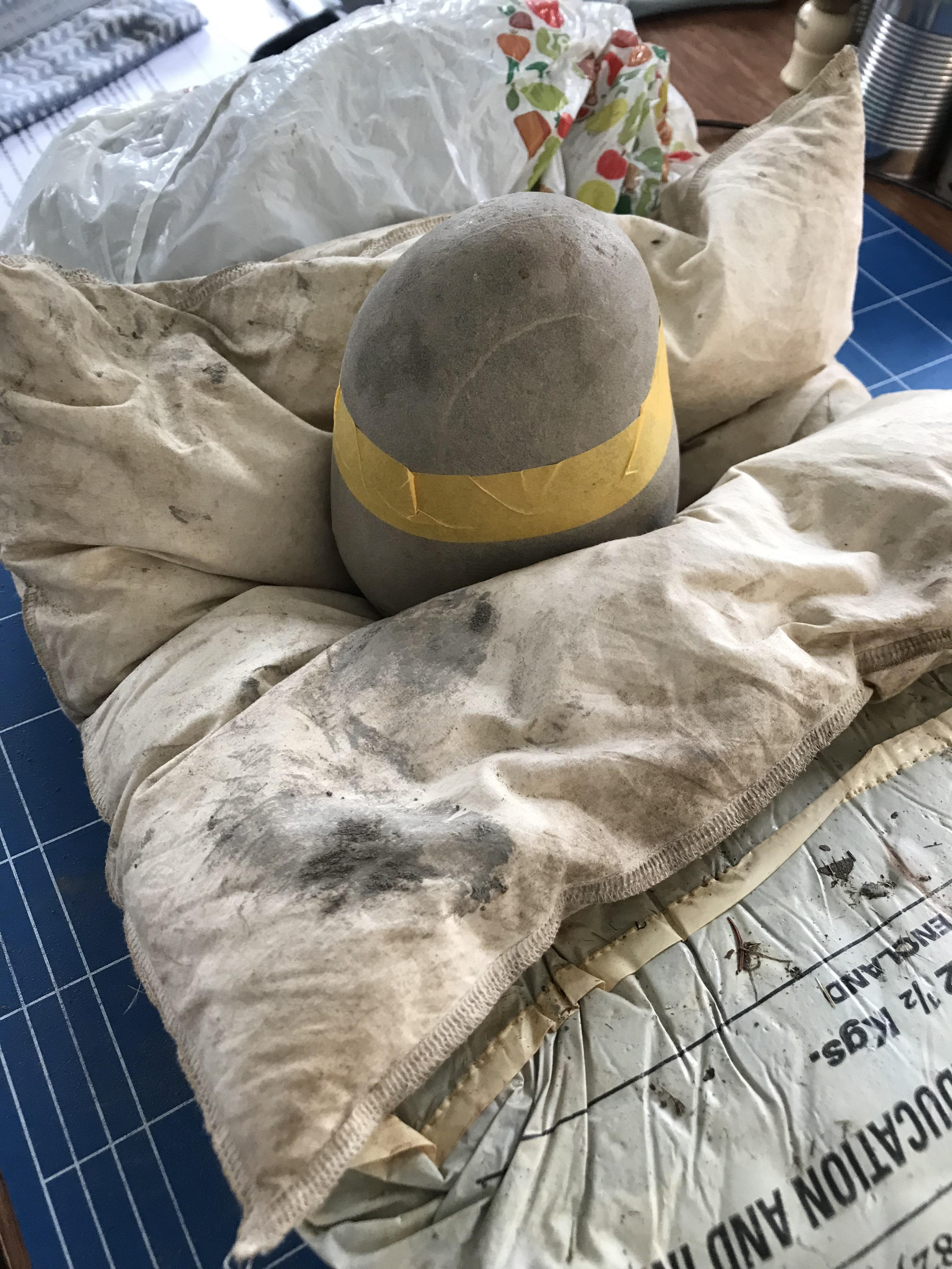 My set up for creating beach clay forms over a beach stone