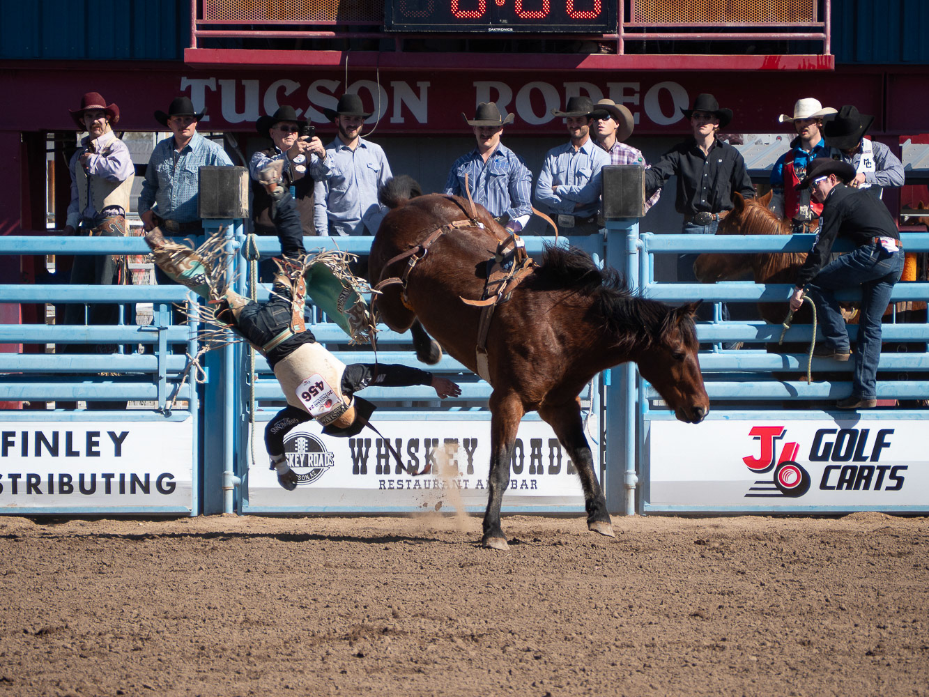Bradlee Miller getting kicked off his bareback horse at the rodeo at La Fiesta de Los Vaqueros Tucson Rodeo on Saturday, February 17th, 2024, in Tucson Arizona. Many different riders were kicked off during the Bareback horse riding event.