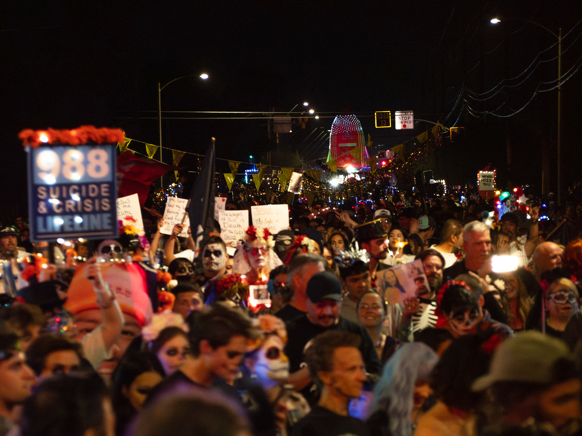 The Crowd walking in the Procession at the All Souls Procession on November 5, 2023, in Tucson Arizona. The crowd included many different people from groups of dancers, mourners, protesters, religious groups and more.