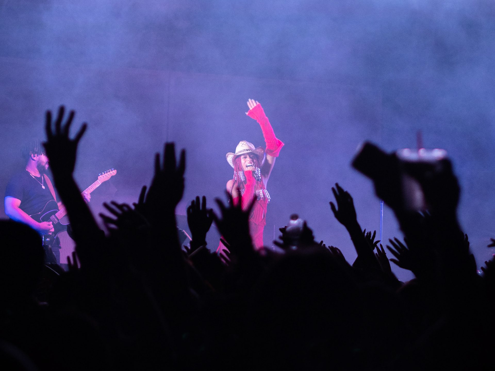 Ravyn Lenae singing on stage at 151 Toole on the Prototype tour on Saturday October 22. She is on tour with Omar Apollo.