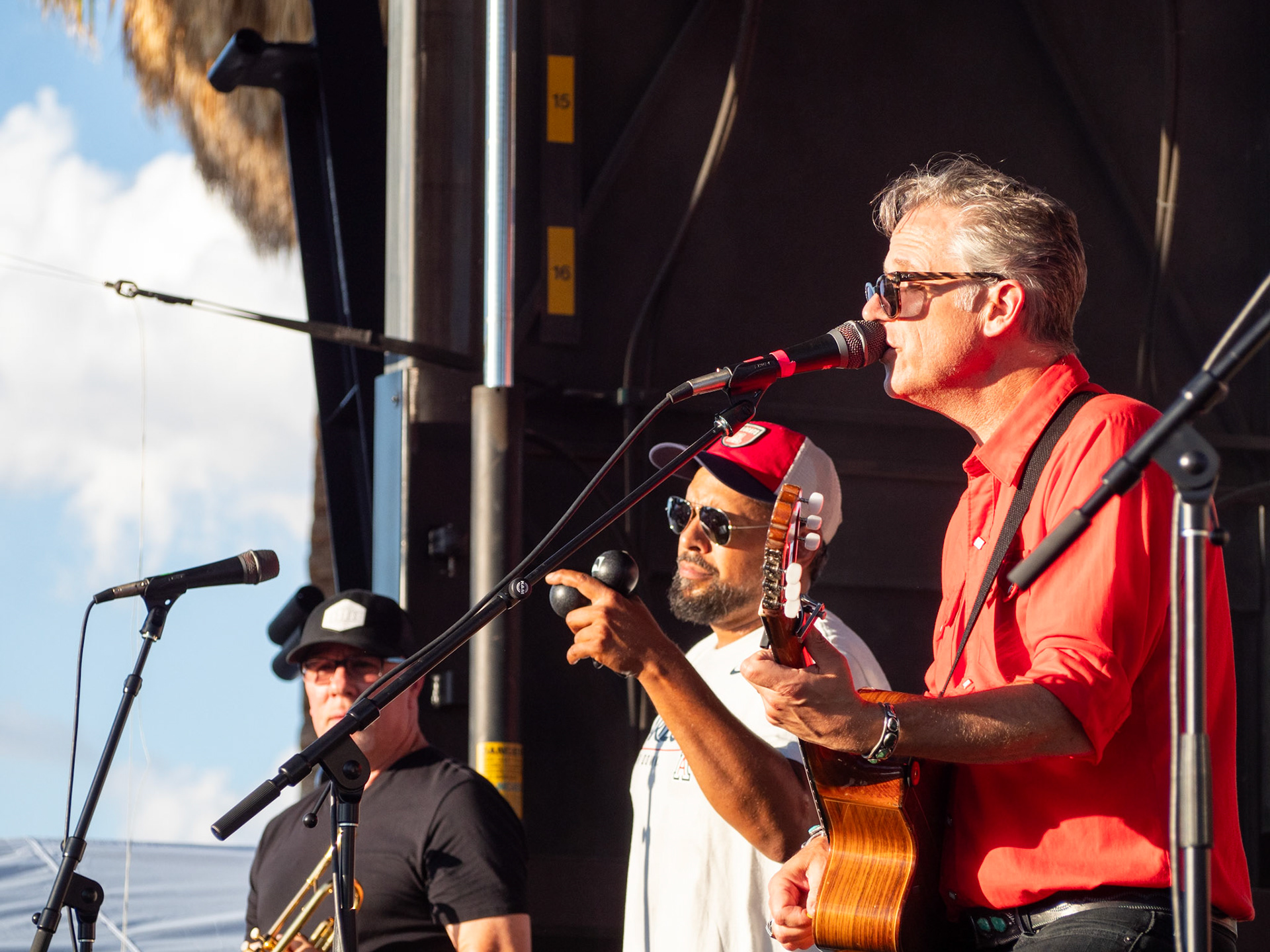 Rick Peron, Jacob Valenzuela, and John Convertino from Calexico playing at the Tailgate performance at the University of Arizona on Sept. 2, 2023. The Tailgate performance was put on by Arizona Arts Live and Arizona Athletics.