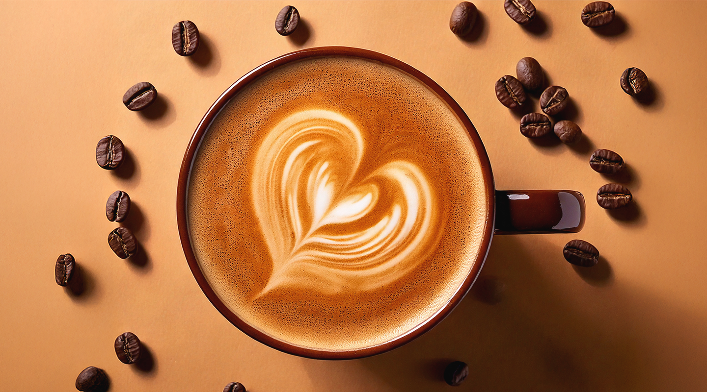Product photography for Rocket Bean with a close up of a coffee cup and coffee beans