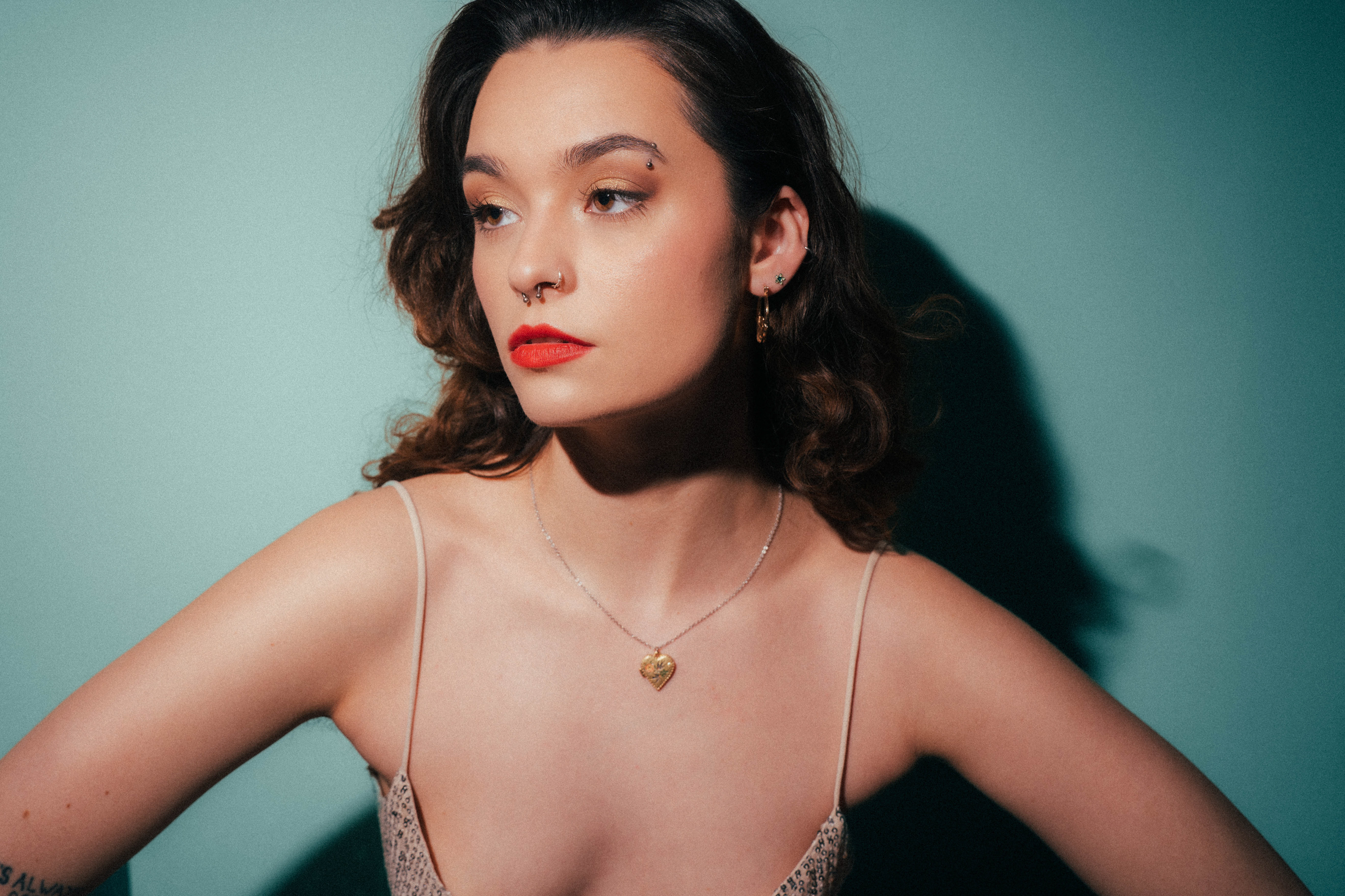 A creative bridal editorial exploring the interplay of light, shadow, and silhouette. A study in intentional composition and timeless bridal style, showcasing the artistic direction of David Carter Weddings.