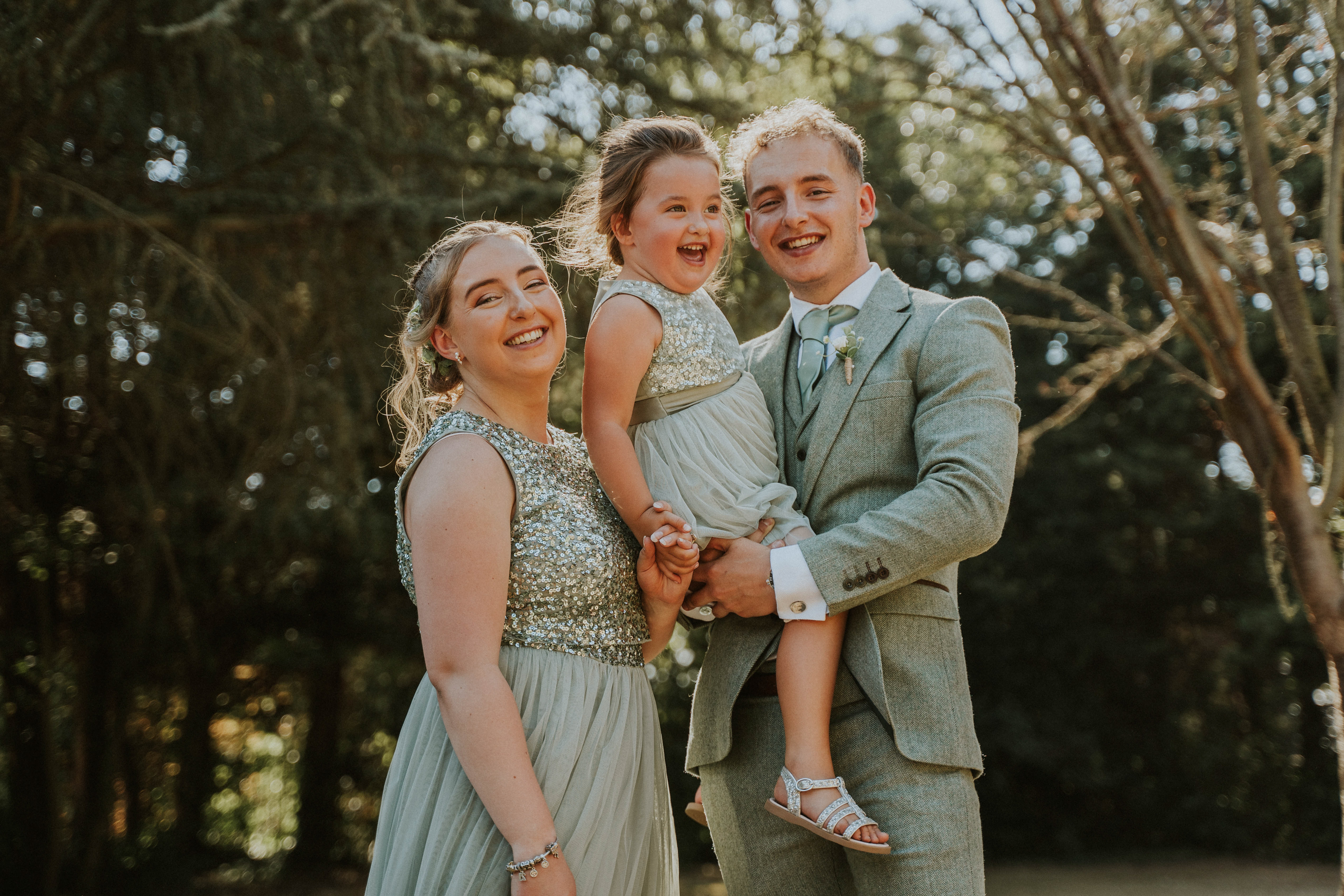 Rustic and industrial wedding storytelling at Red Brick Barn, Sutton Hall in Essex. Featuring vintage tractors and authentic moments.