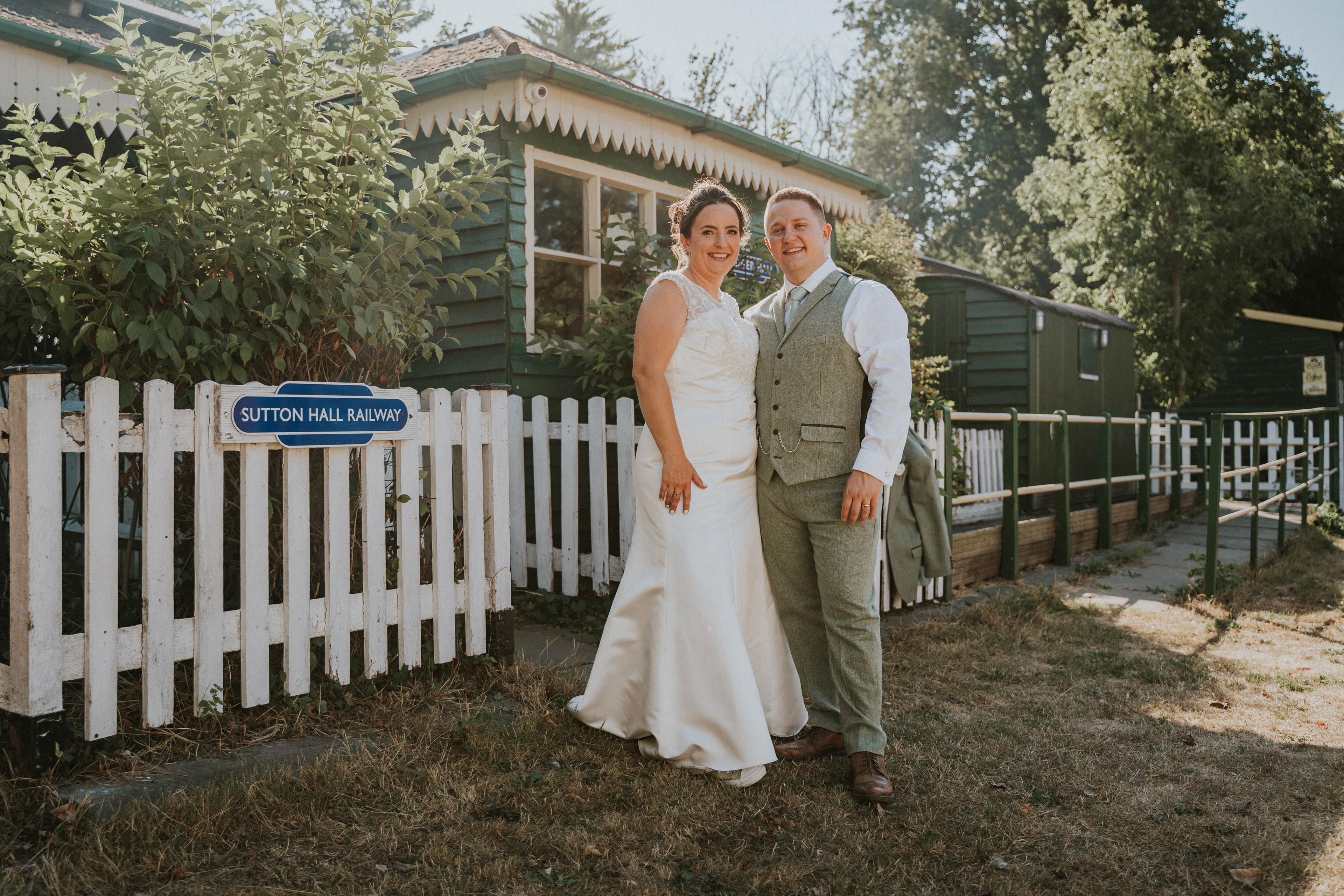 Rustic and industrial wedding storytelling at Red Brick Barn, Sutton Hall in Essex. Featuring vintage tractors and authentic moments.