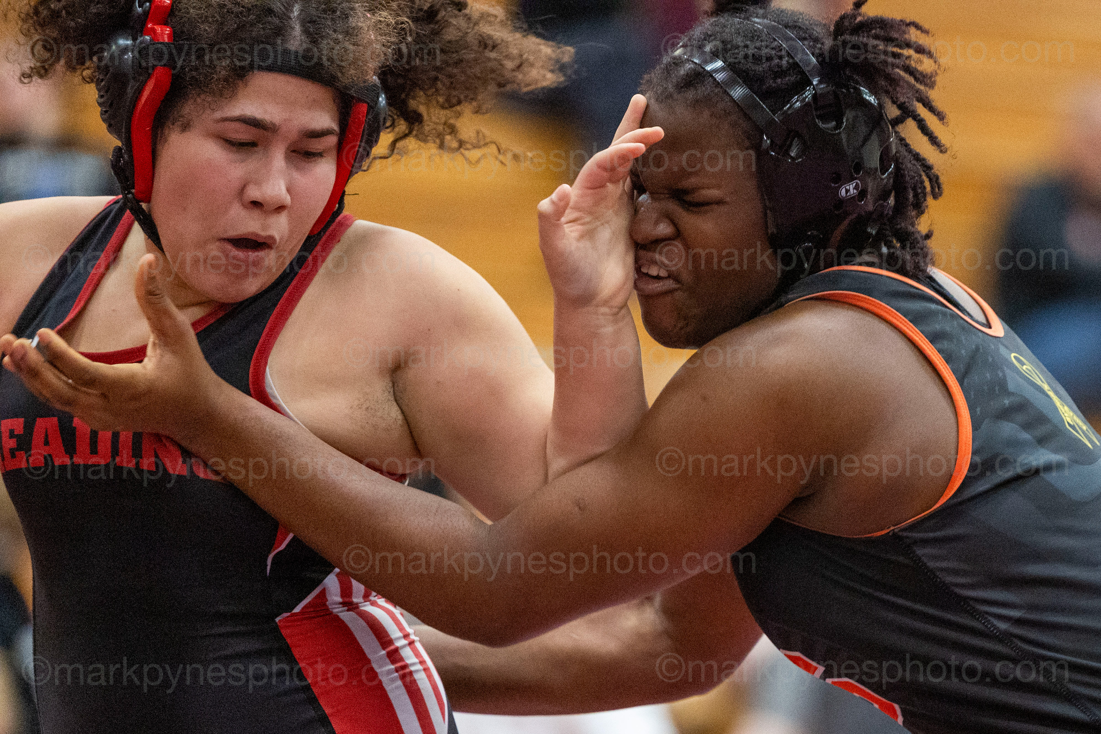Reading’s Aneleyshka Rivera tries to break loose from Angela Imorhoa, York Suburban, in the 170-pound final.