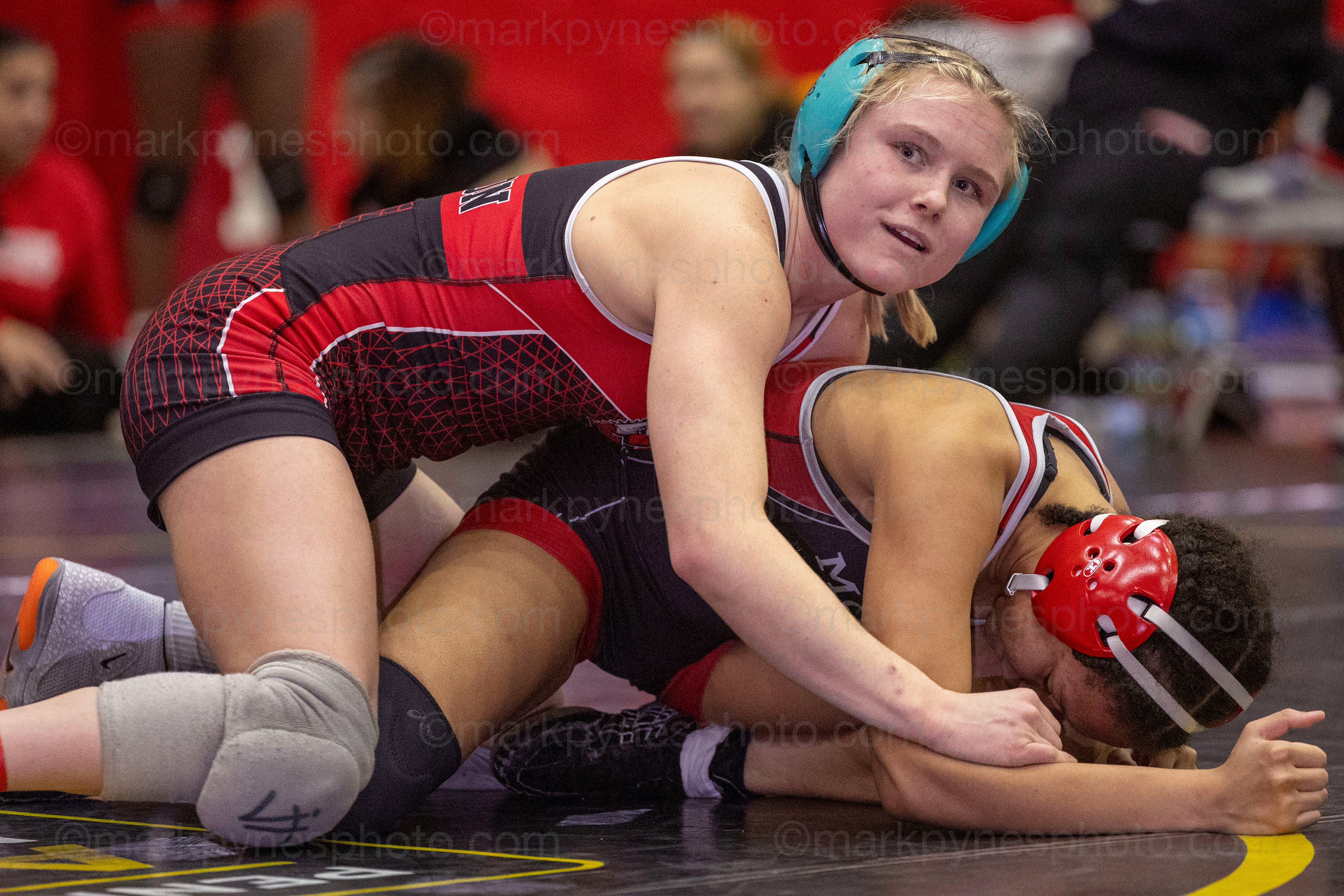 Aubre Krazer, Easton, pins Kazchmir Mormolejos, in 2:20 of their 136-pound quarterfinal round match.