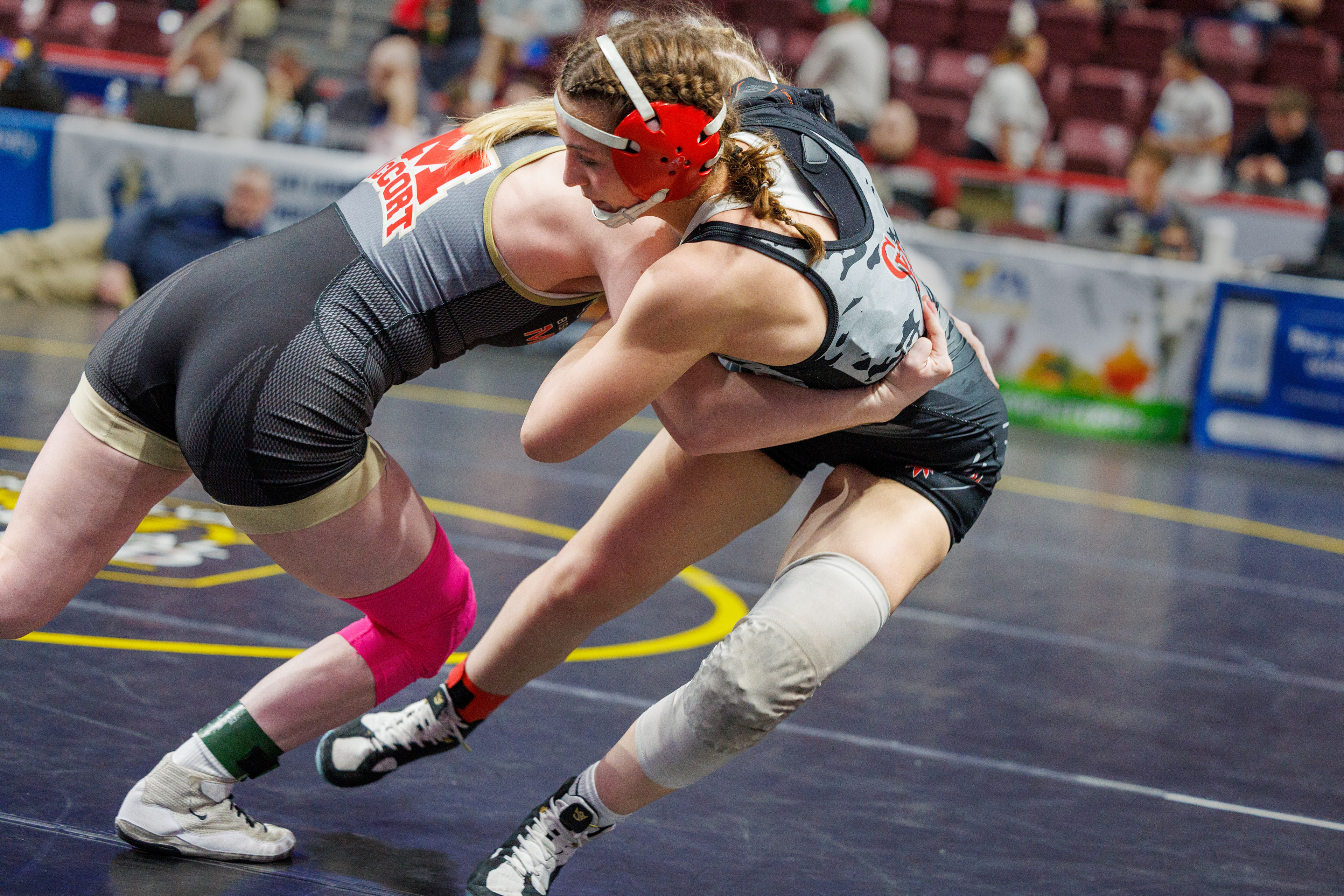 Jordyn Fouse (Bishop McCort) left, won by tech. fall over Mariana Bruscino (Cumberland Valley), 21-5, in 1:32, in a 136-pound opening round match at the PIAA Girls Wrestling State Championships at the Giant Center in Hershey, Pa., Mar. 7, 2024.