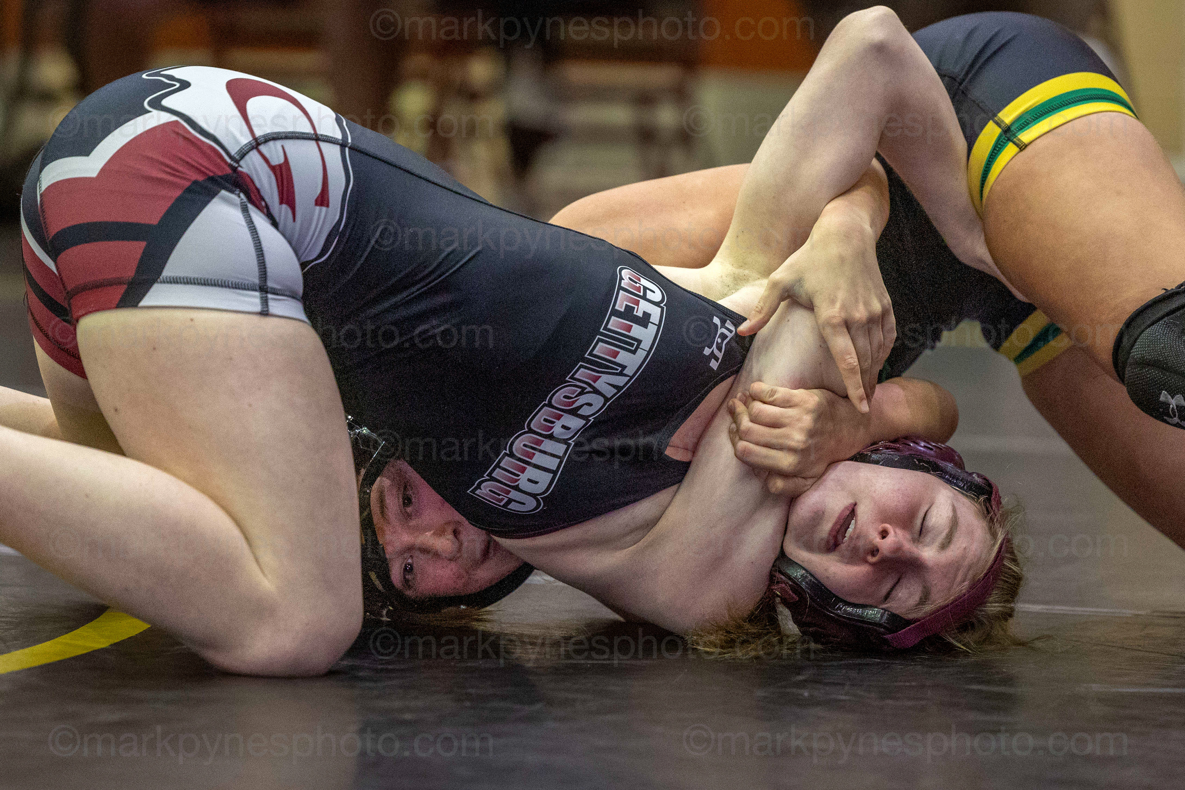 Maura Campbell tries to turn Gettysburg’s Alyssa Vaughn on her way to a 1:34 pin in the 130-pound match.