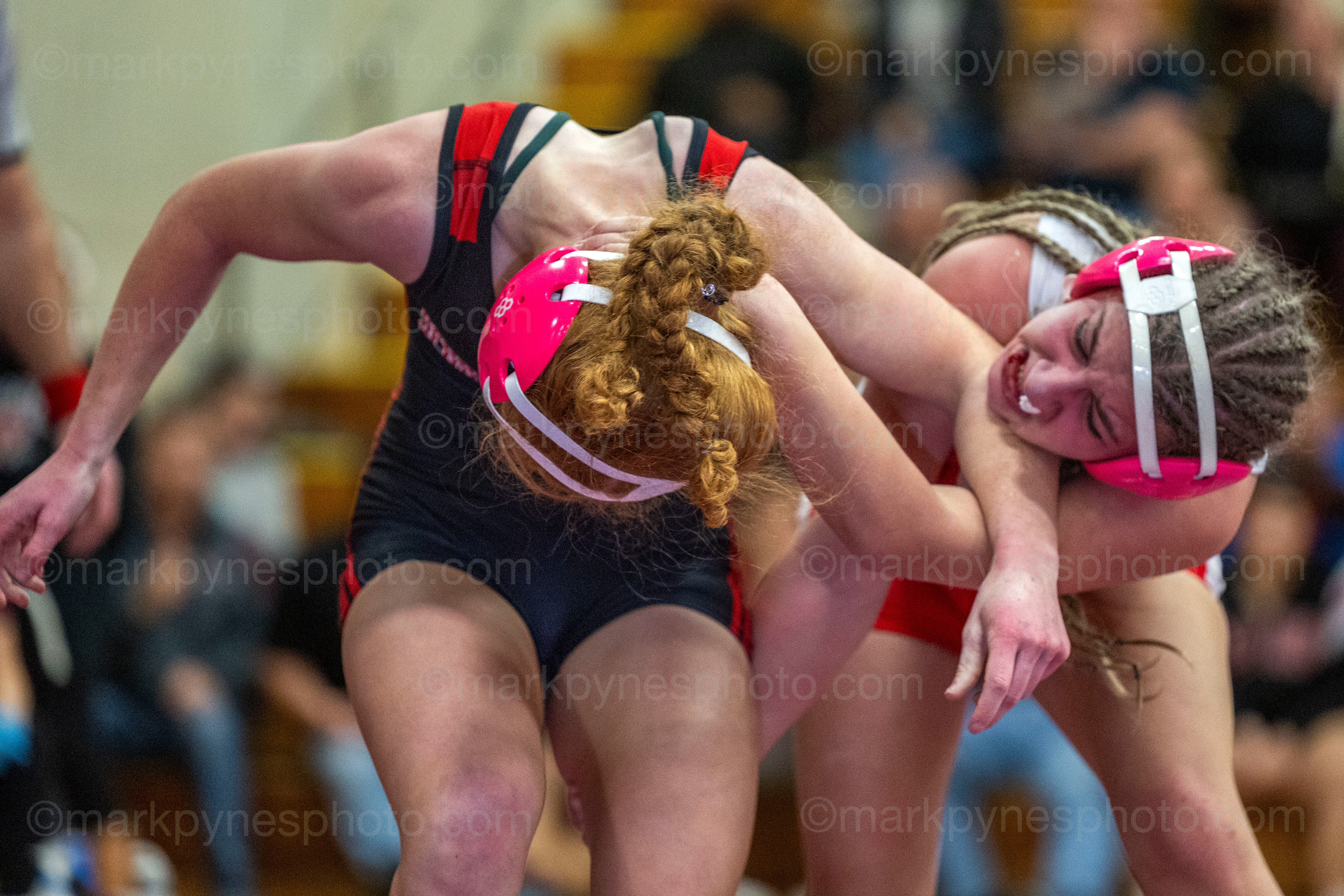 Addison Becht, Schuylkill Valley, ties up Hayley Cilento, Wilson, left, in the 124-pound final, won in a 9-3 decision by Becht.
