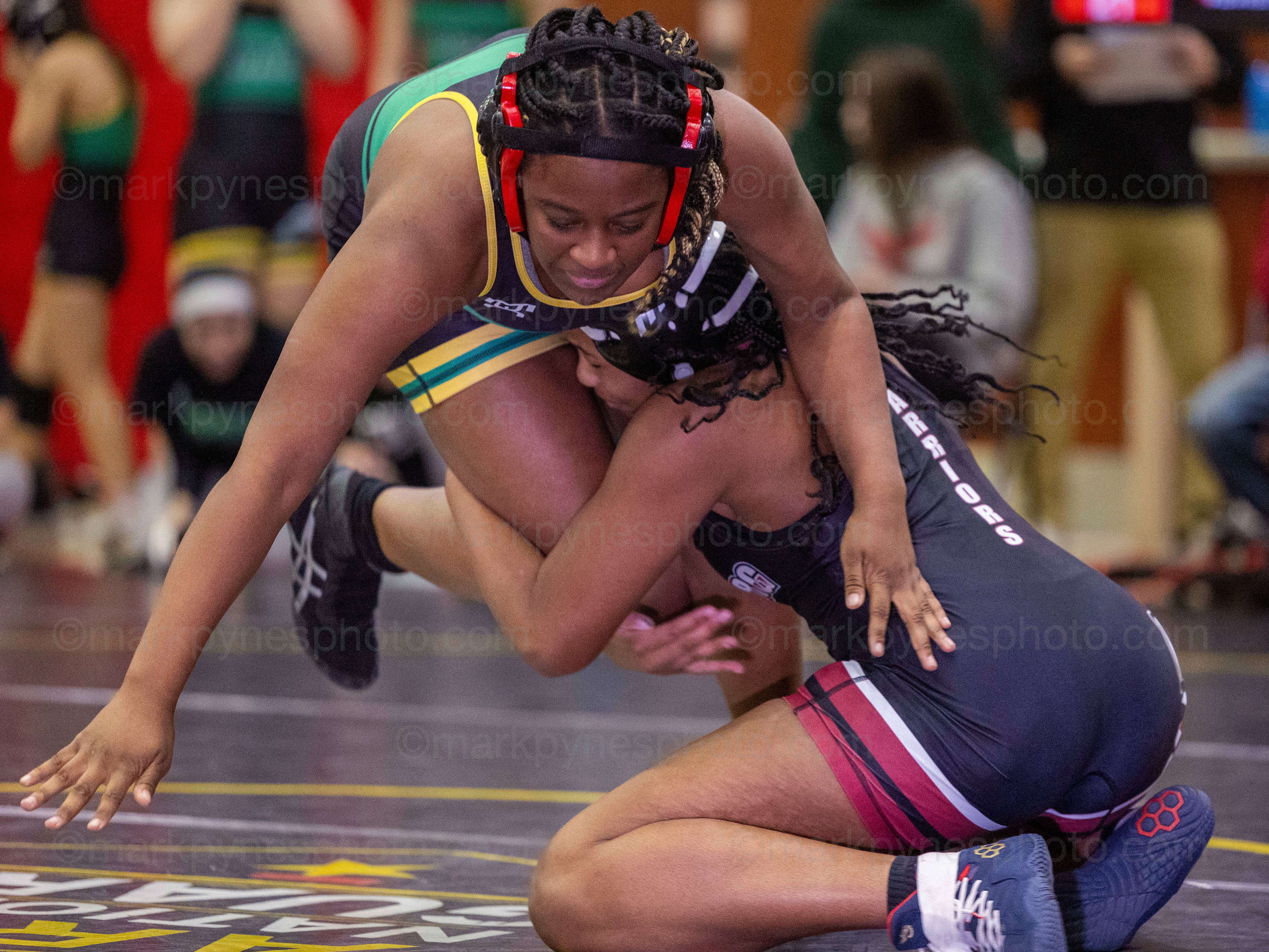 Adrianna Bowling, Gettysburg, shoots in on Central Dauphin’s Brooklyn Gilbert, on her way to a 59 second pin in the 155-pound match.