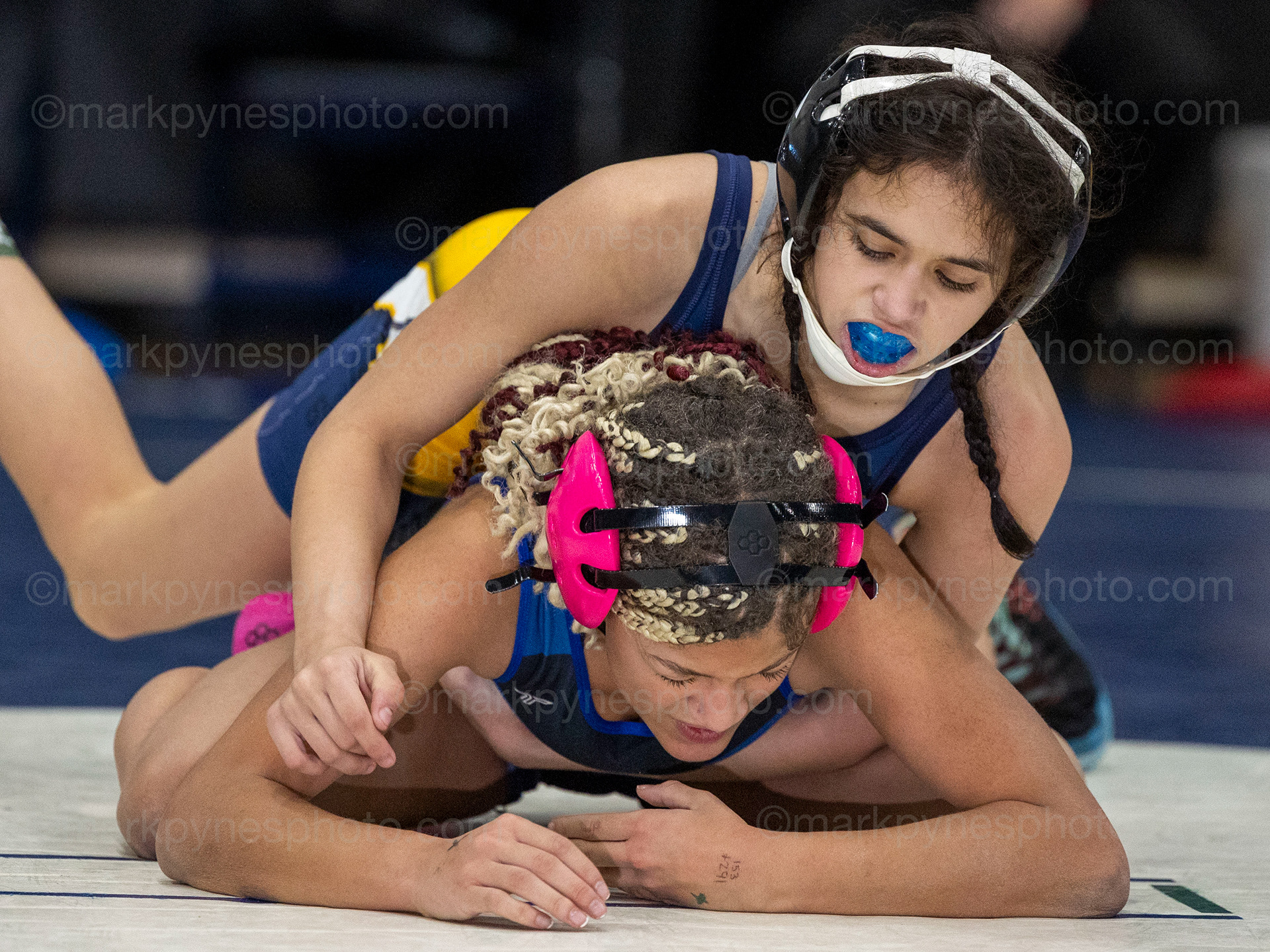 Upper Perkiomen’s Keyra Seville, rides Zaria Phillips, Elizabethtown, but gets pinned in 3:32, in the 100-pound final.