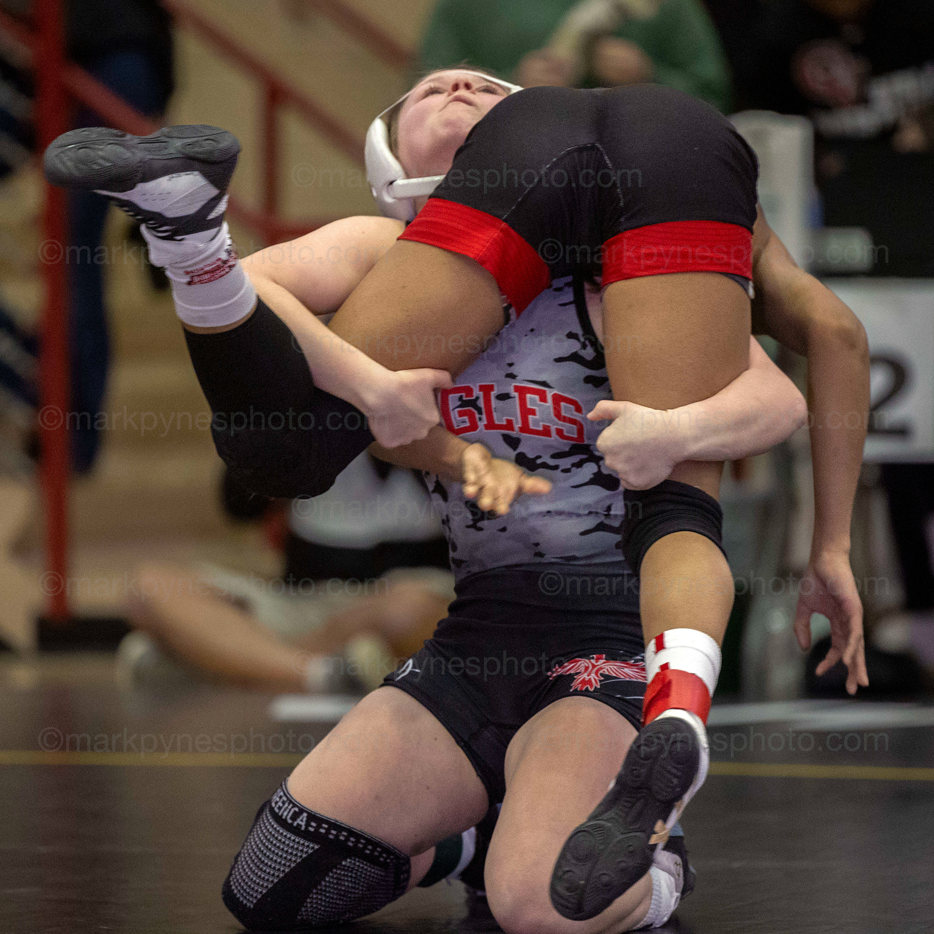 Lillian Seagreaves, Cumberland Valley, lifts J.P. McCaskey’s Nasly Rijo on the way to a 1:15 pin in the 106-pound match.