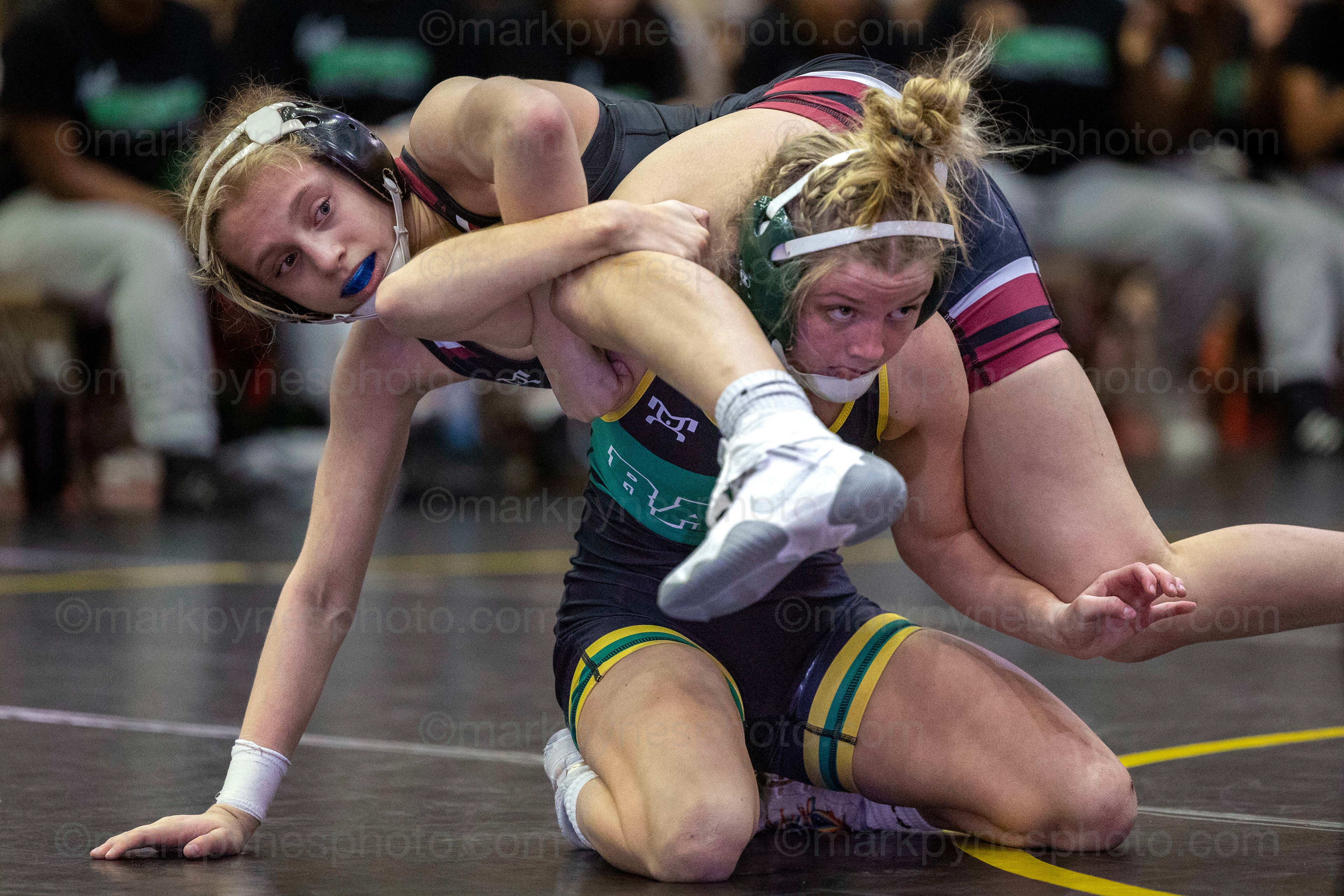 Kate Hollinger, Central Dauphin, lifts Gettysburg’s 106-pounder Taylor Keckler, on her way to an 8-7 decision.