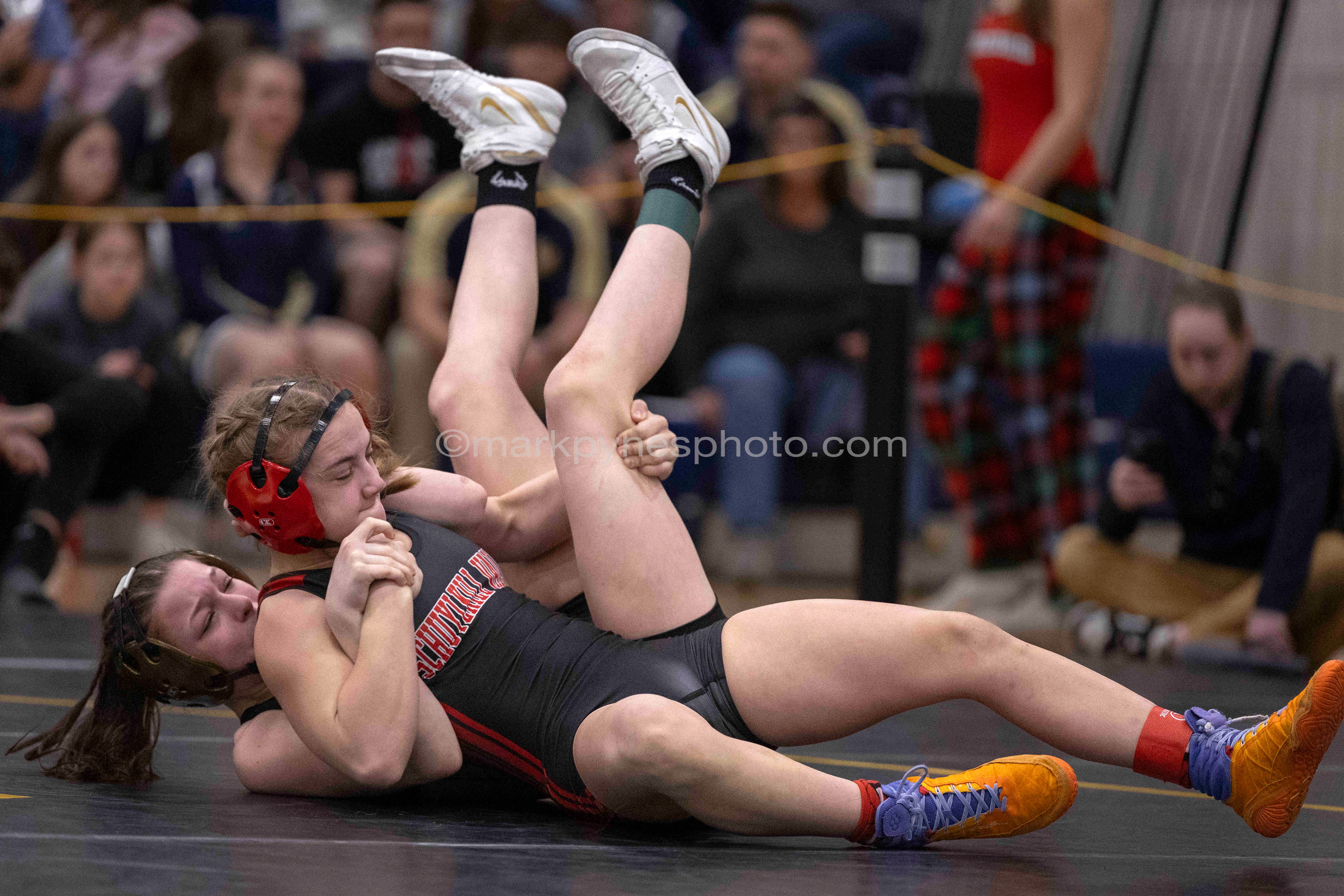 Alexis Moscone, Schuylkill Valley, right, decisions Faith Gladfelter, Delone Catholic, 14-11, in the 118-pound final at the 2025 District III South Central Regional Championships in Millersville, Pa., Mar. 1, 2025.