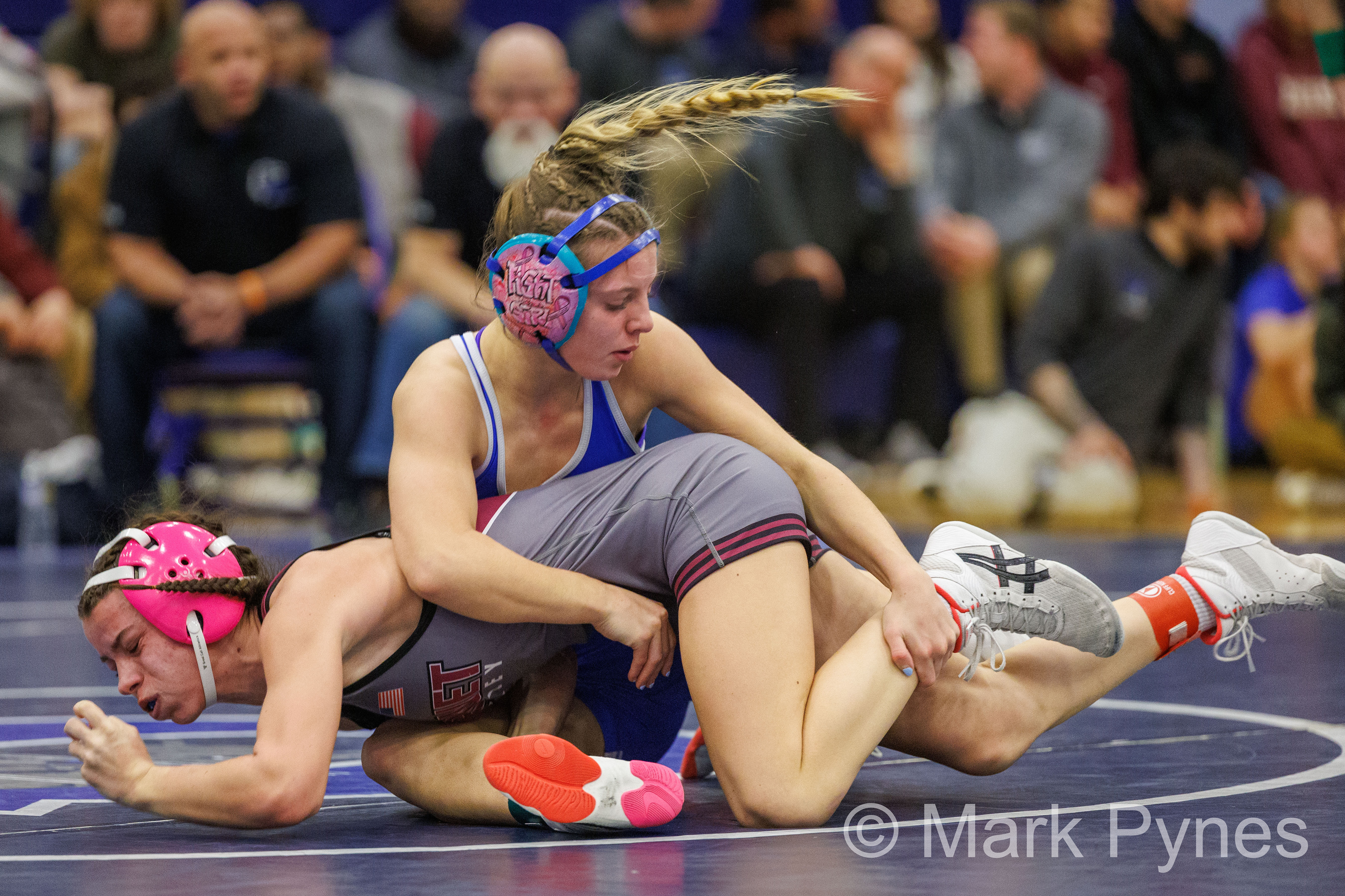 Julia Horger (Conwell-Egan) controls Reese Dewar (Garnet Valley), before pinning her at the 4:00 mark, in the 106-pound final at the South East Regional girls high school wrestling championship finals in Quakertown, Pa., Feb. 25, 2024.