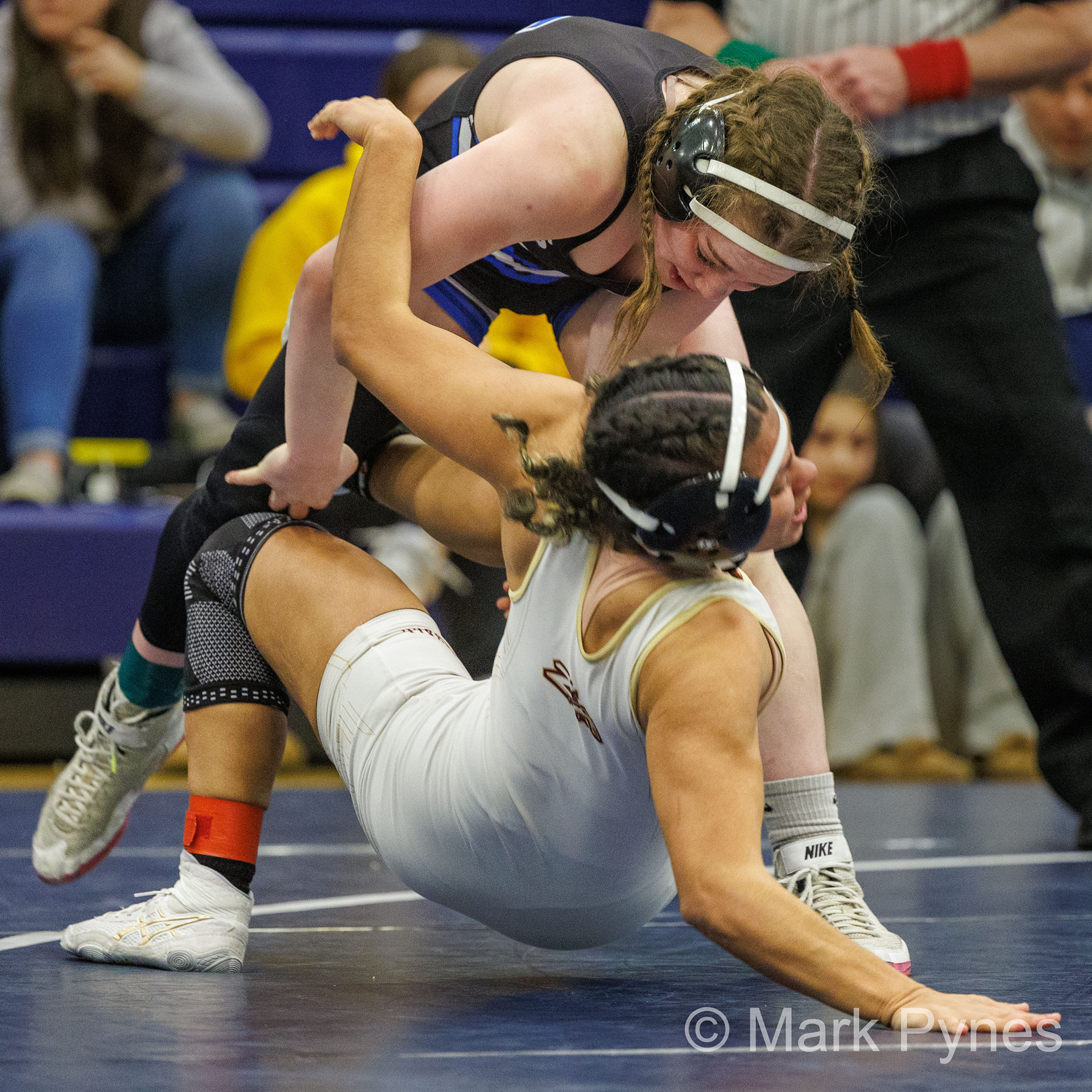 Haylie Jaffe (Kennett) throws Ruth Rivera (Whitehall), before winning by Fall in 2:00, in the 136-pound final at the South East Regional girls high school wrestling championship finals in Quakertown, Pa., Feb. 25, 2024.