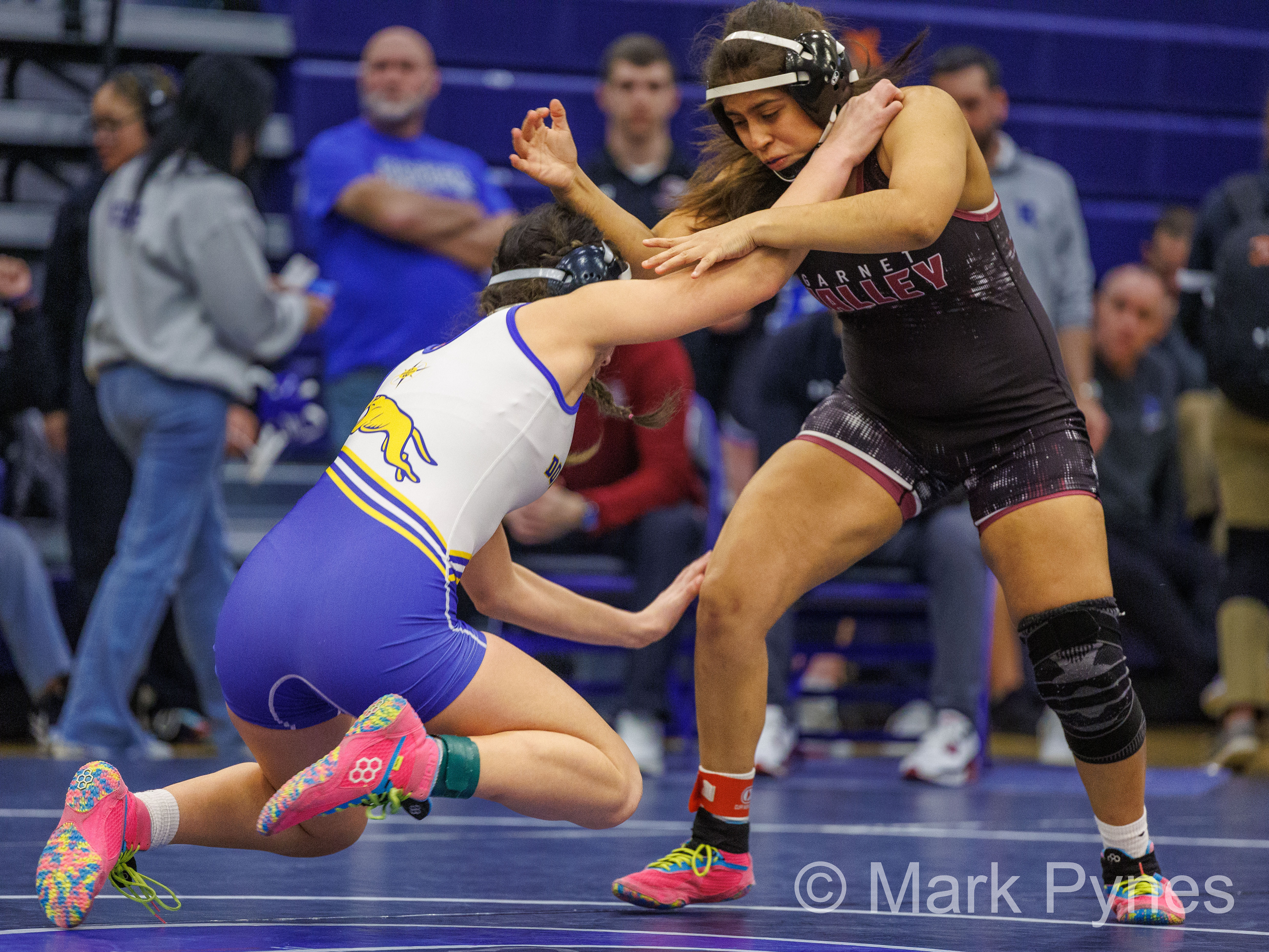 Sienna Landrum (Downingtown West) shoots on Jessica Ayala (Garnet Valley), before winning the 142-pound final by Fall, in 1:17, at the South East Regional girls high school wrestling championship finals in Quakertown, Pa., Feb. 25, 2024.
