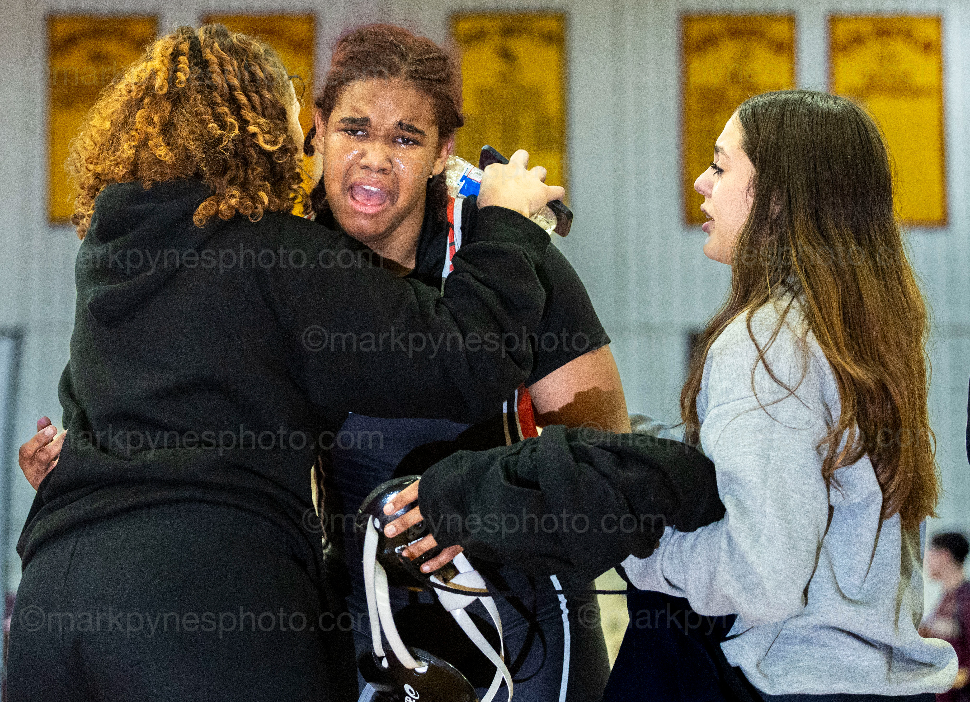 Jurelys Peguero del Rosario, J.P. McCaskey, gets emotional after winning the 190-pound final at the Governor Mifflin Girls Wrestling tournament at Shillington, Pa., Dec. 28, 2024. At right is teammate Journie Rodriguez.