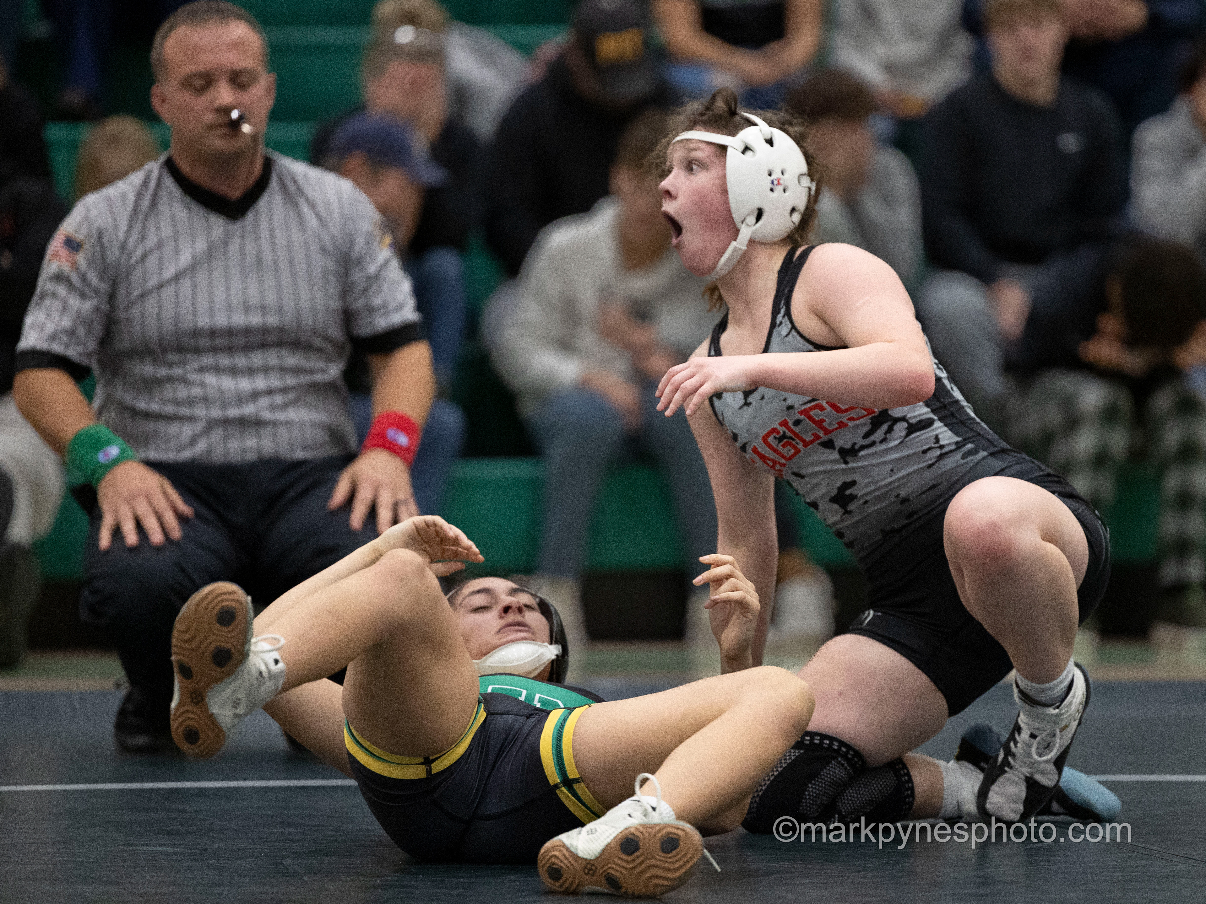 Lillian Seagreaves, Cumberland Valley, appears shocked after pinning Central Dauphin’s Ana Morales at 3:23, in their 118-pound match, as CV defeats Central Dauphin, 42-30, in girls wrestling dual meet action in Harrisburg, Pa., Dec. 10, 2024.