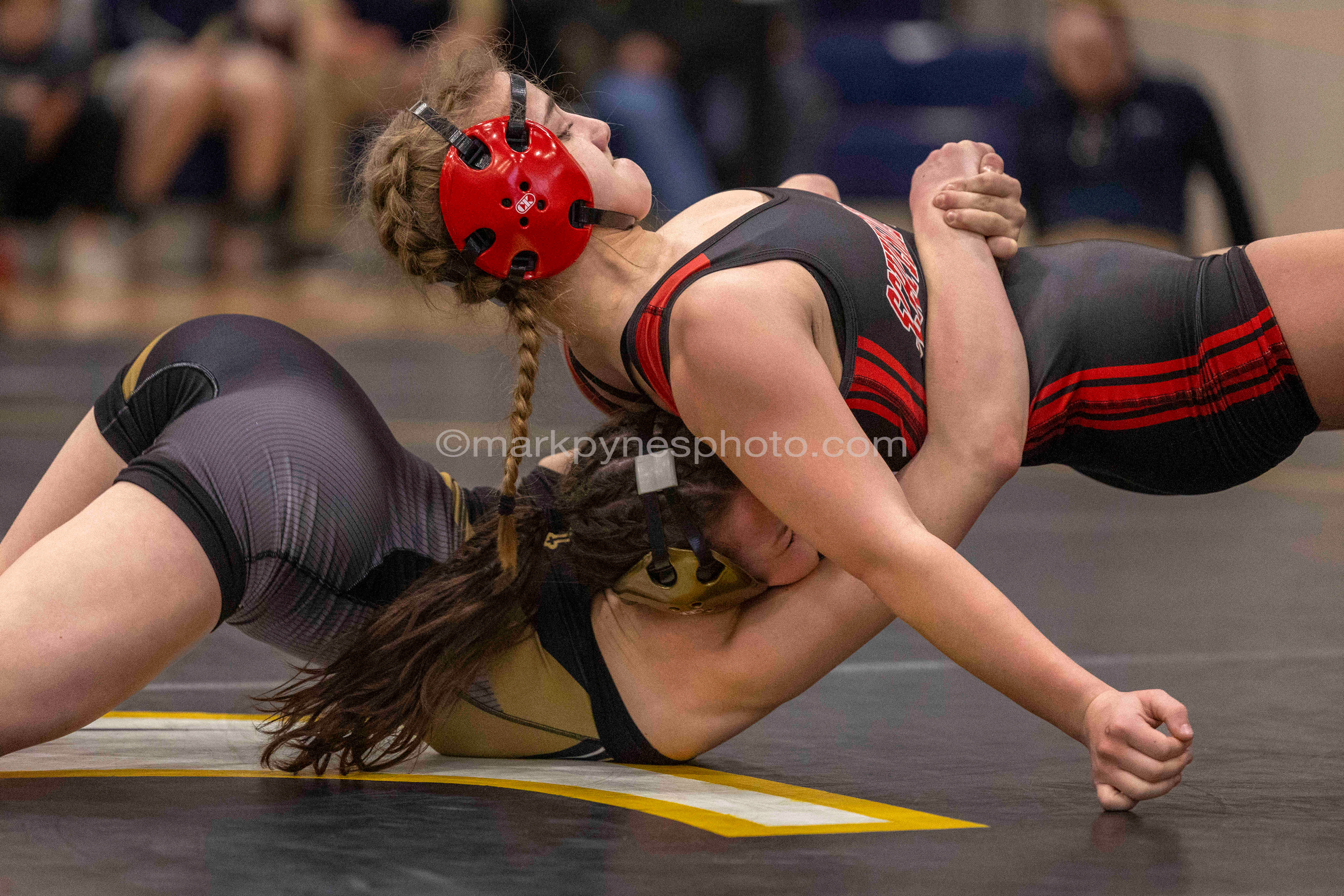 Alexis Moscone, Schuylkill Valley, top, decisions Faith Gladfelter, Delone Catholic, 14-11, in the 118-pound final.