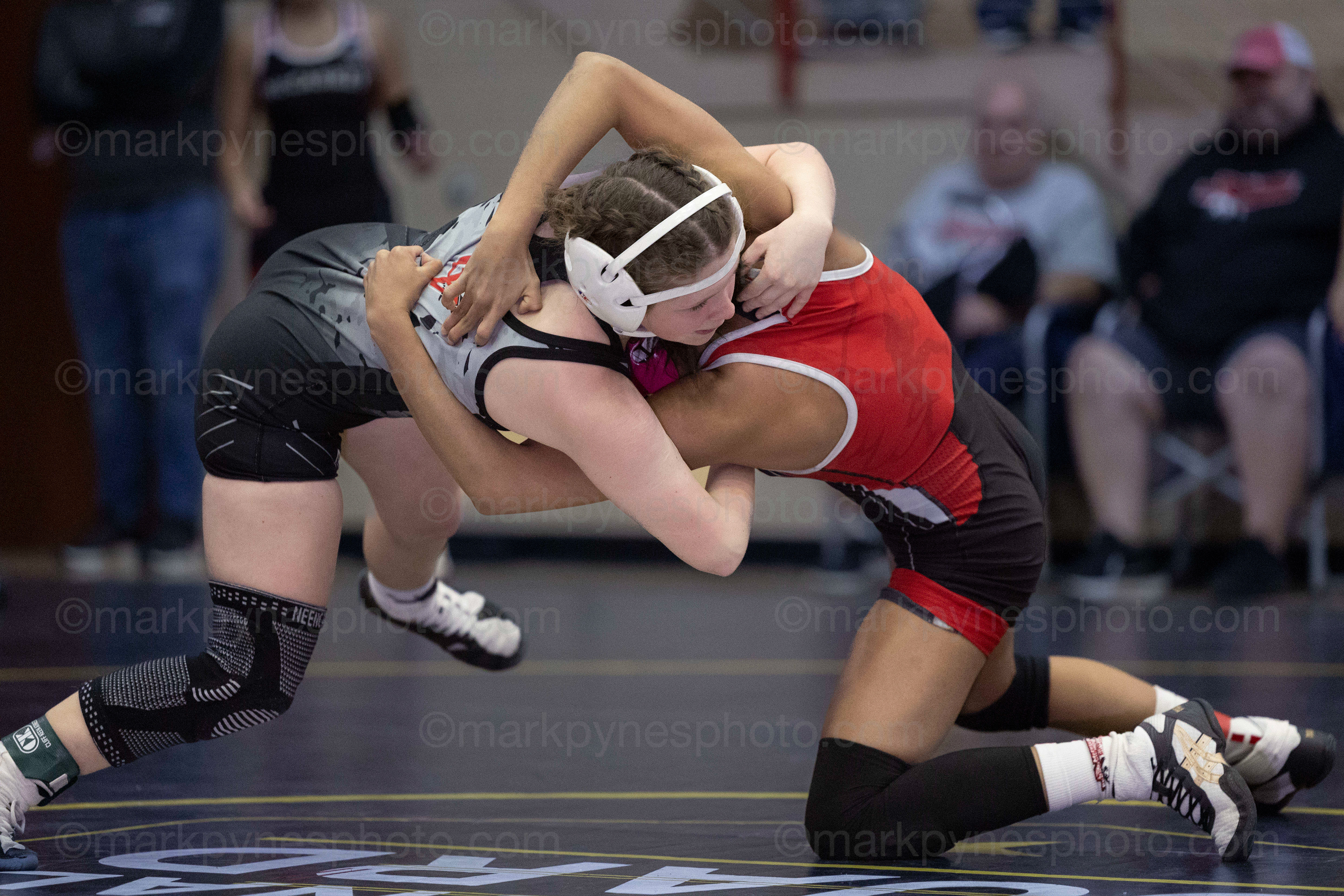 Lillian Seagreaves, Cumberland Valley, turns J.P. McCaskey’s Nasly Rijo on the way to a 1:15 pin in the 106-pound match.