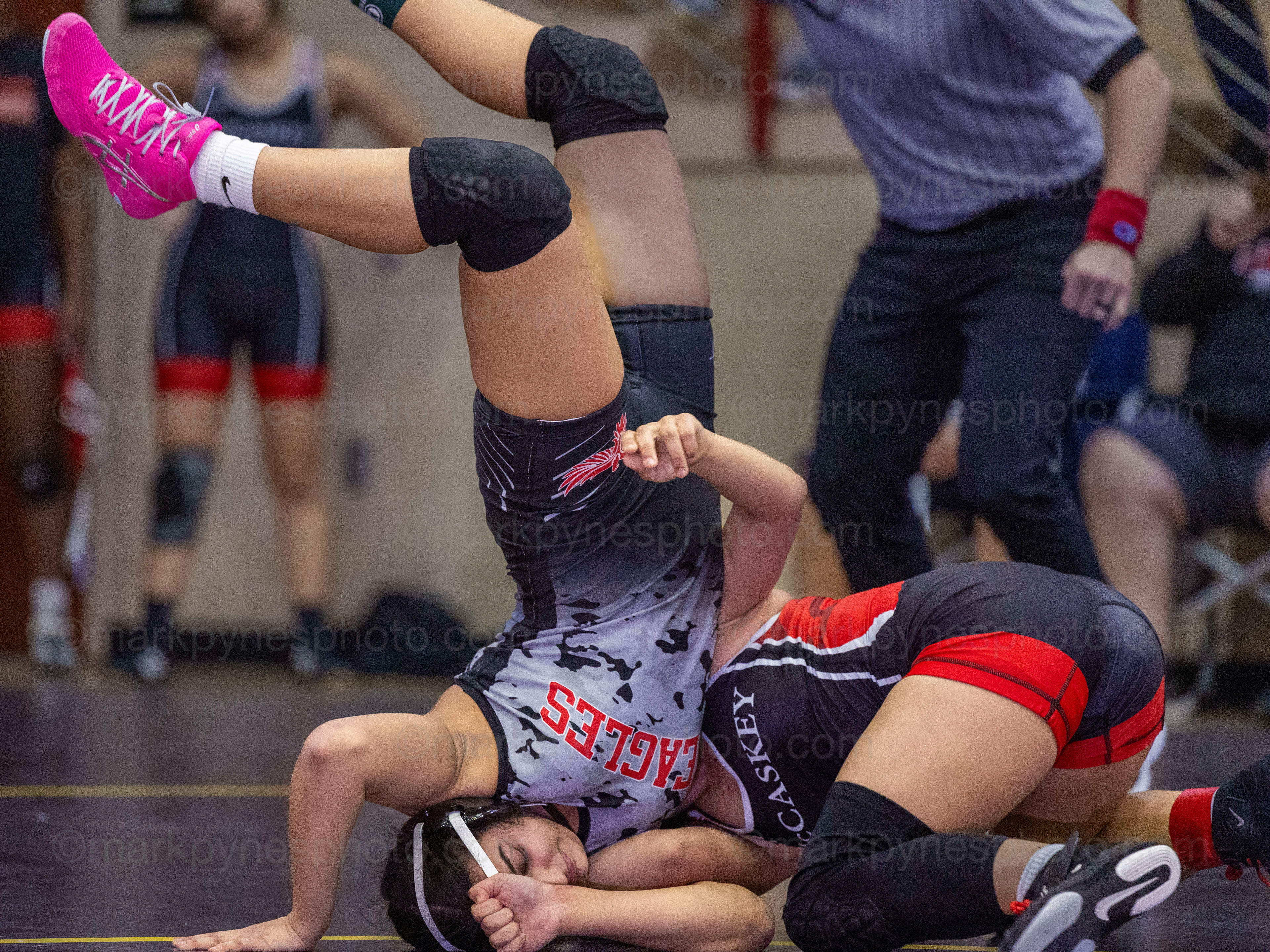 Kaleia Timko, J.P. McCaskey, flips Cumberland Valley’s Vedika Rajput, before pinning her in 1:31, in the 136-pound match.