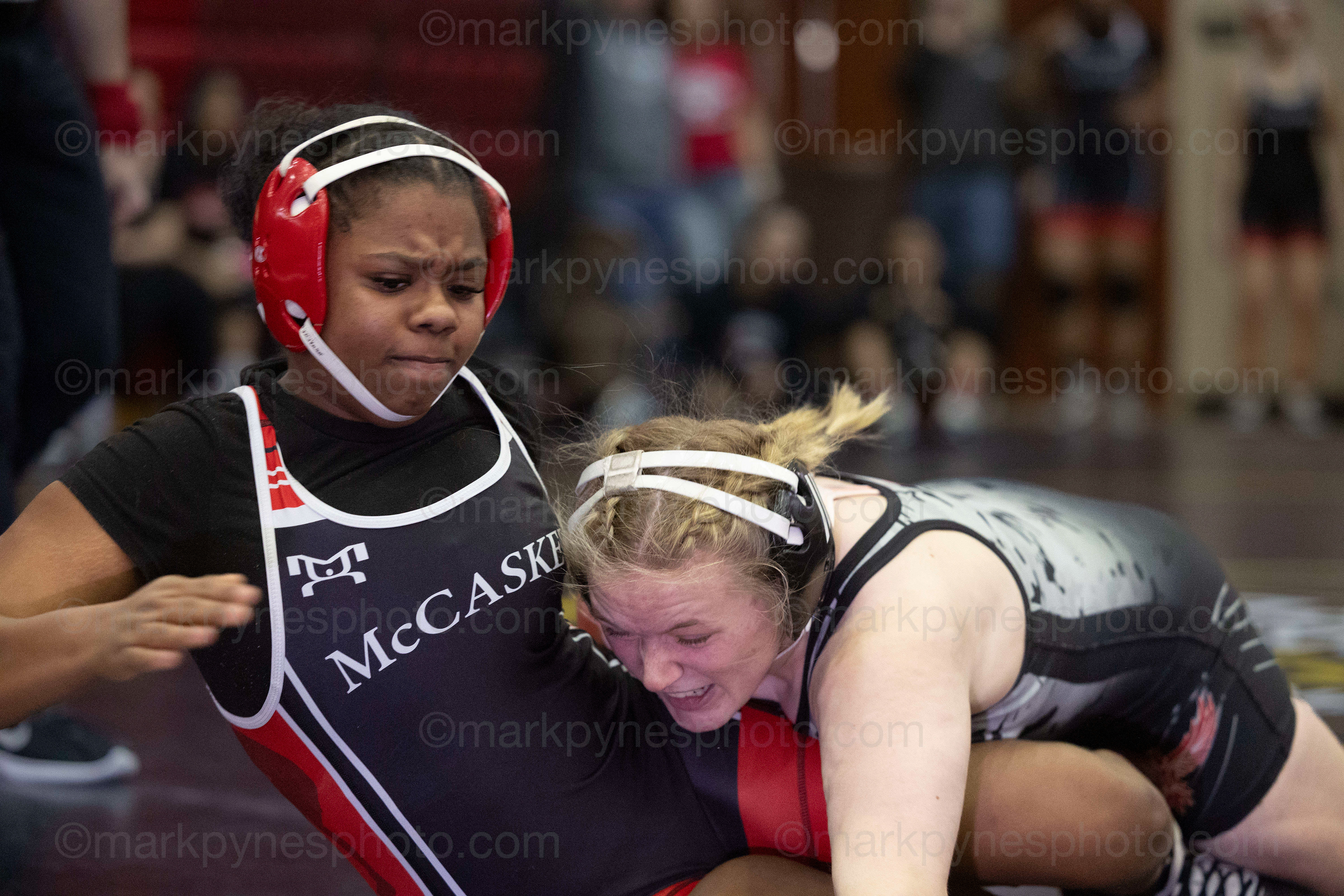 Myah Mulgrew, Cumberland Valley, takes down J.P. McCaskey’s Kashmere Aguilera, in the 155-pound match.