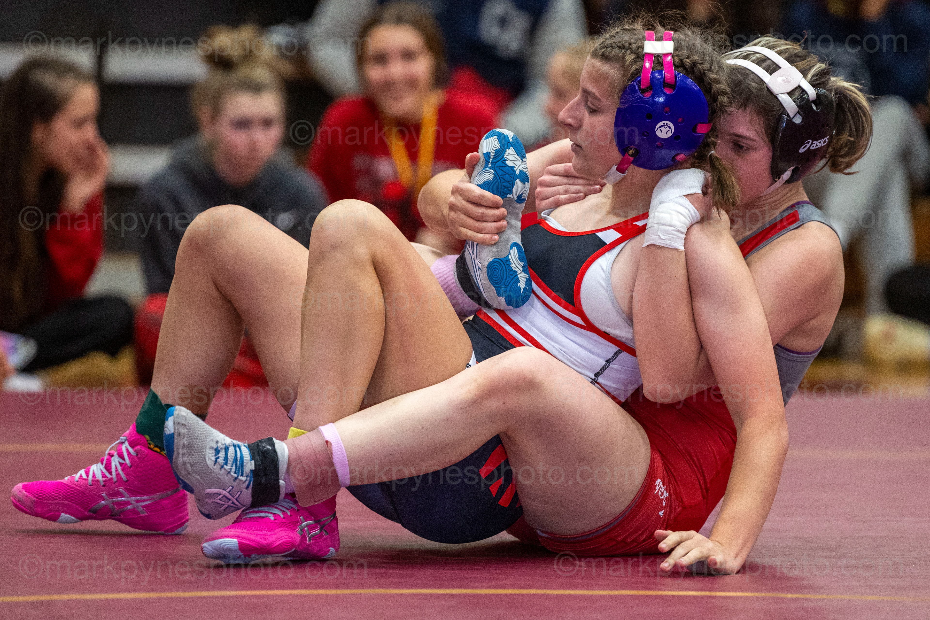 Emily Sarr, Souderton, backs into Parkland’s Saige Rittenhouse, before winning by pin, in 3:03, in the 118-pound final.