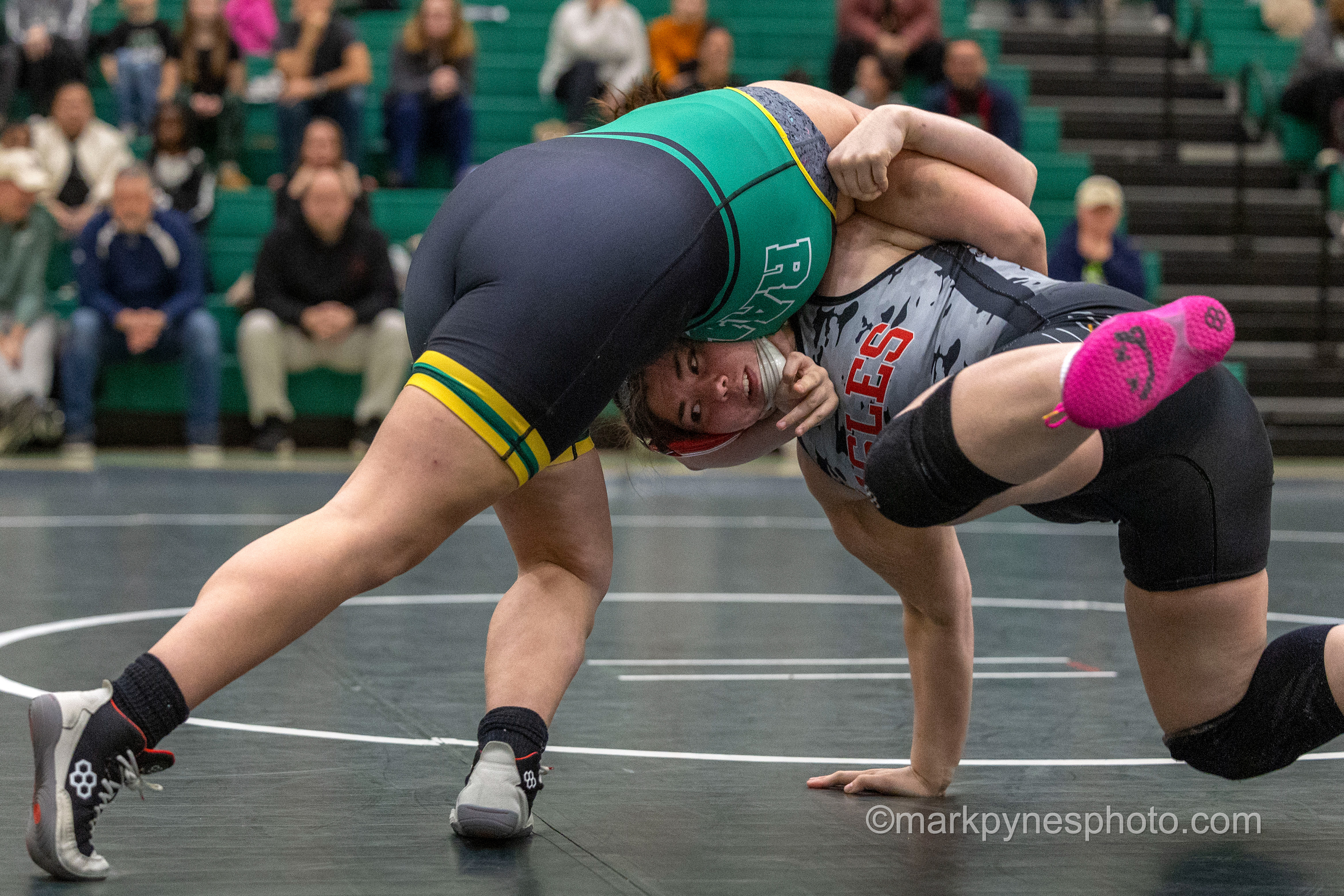 Layla Barrios, Central Dauphin, rolls Cumberland Valley’s Lee Hechler in their 235-pound match, actually won in a fall by Hechler.