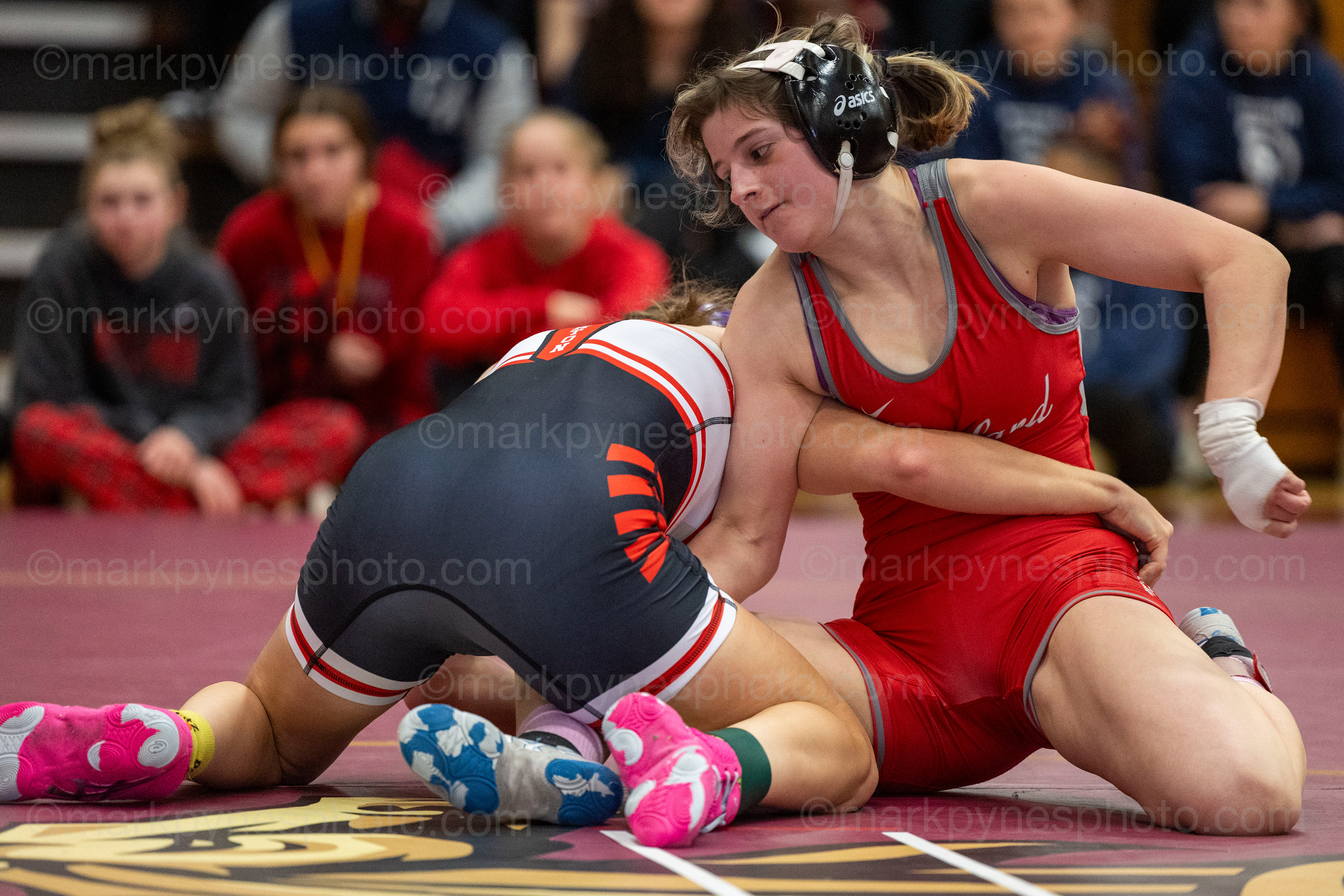Parkland’s Saige Rittenhouse tries to reverse Emily Sarr, Souderton, in the 118-pound final.