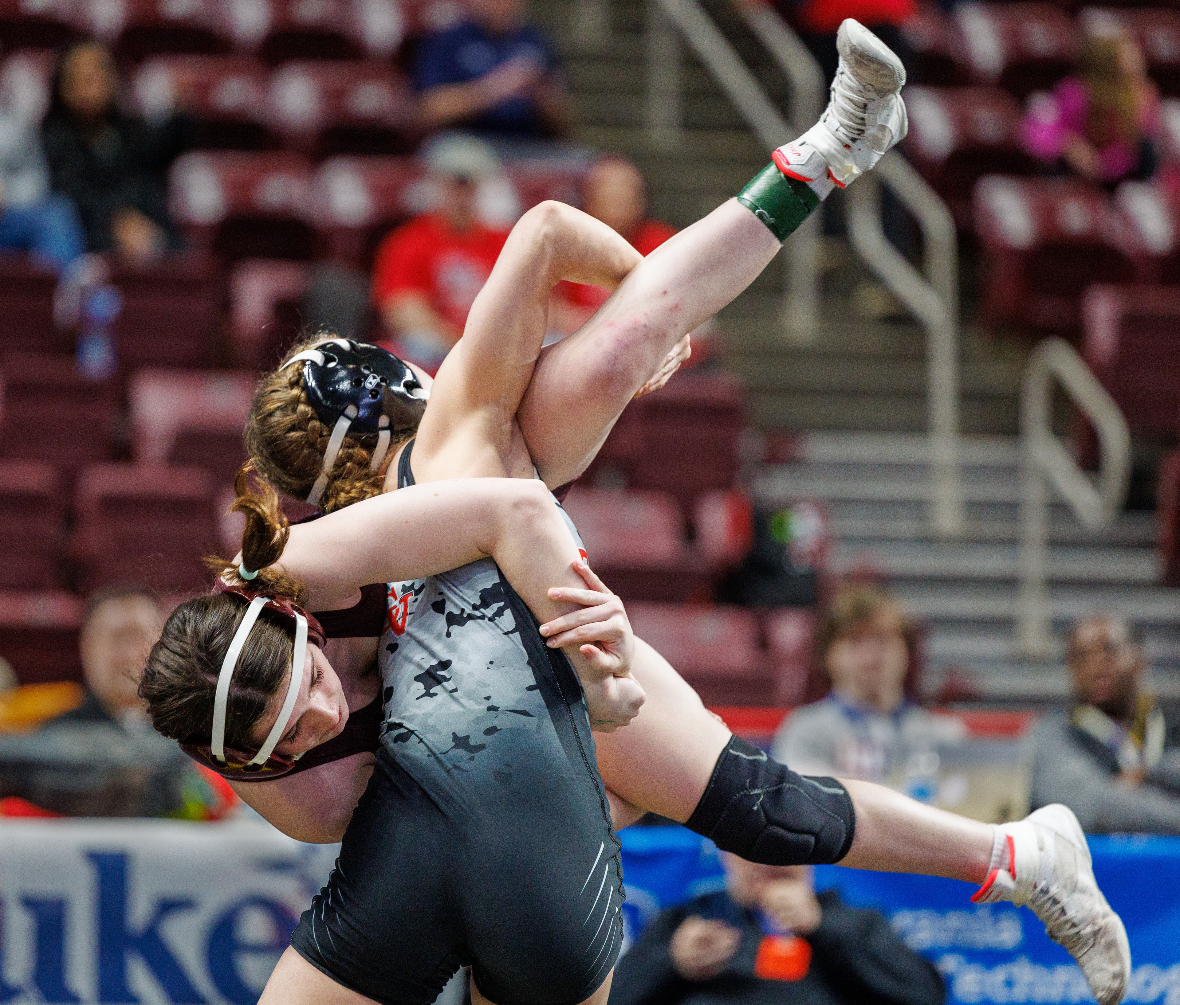 Eliana White-Vega pins Gracie Clift, Abington, in 0:25, in a 124-pound opening round match at the PIAA Girls Wrestling State Championships at the Giant Center in Hershey, Pa., Mar. 7, 2024.