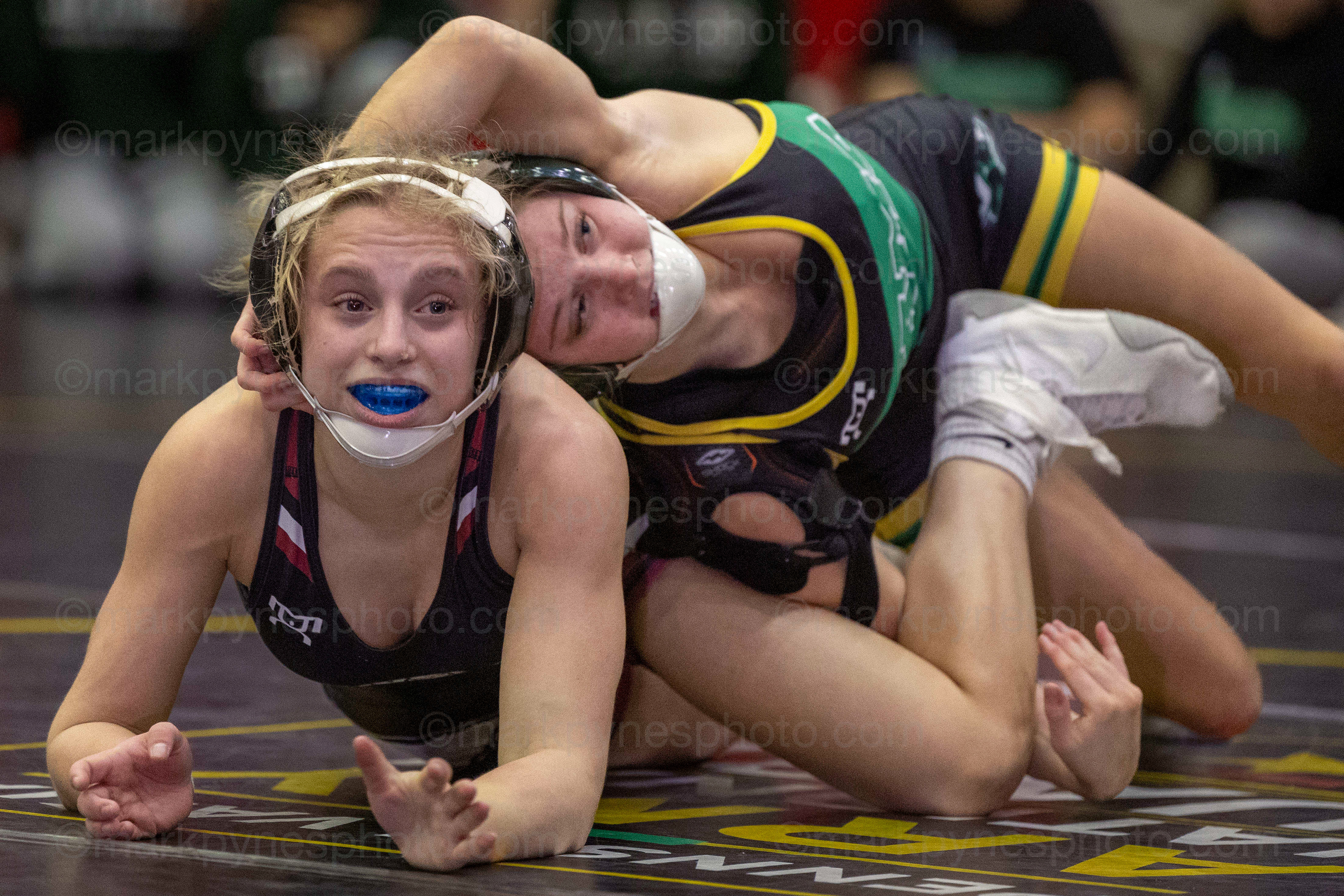 Kate Hollinger, Central Dauphin, reverses Gettysburg’s 106-pounder Taylor Keckler, on her way to a 8-7 decision.
