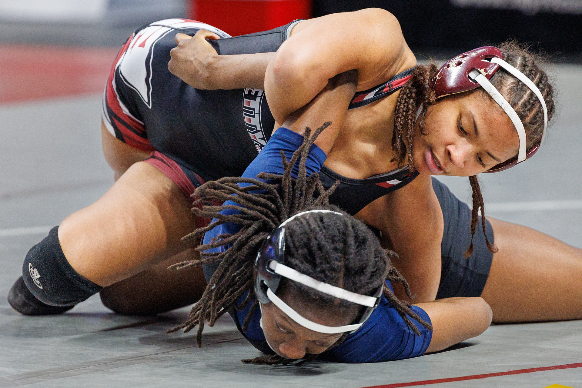 Zalika Roberts, Gettysburg, decisions Asia Fowler, Woodland Hills, 2-0, in a 130-pound match in the opening round of the PIAA Girls Wrestling State Championships at the Giant Center in Hershey, Pa., Mar. 7, 2024.