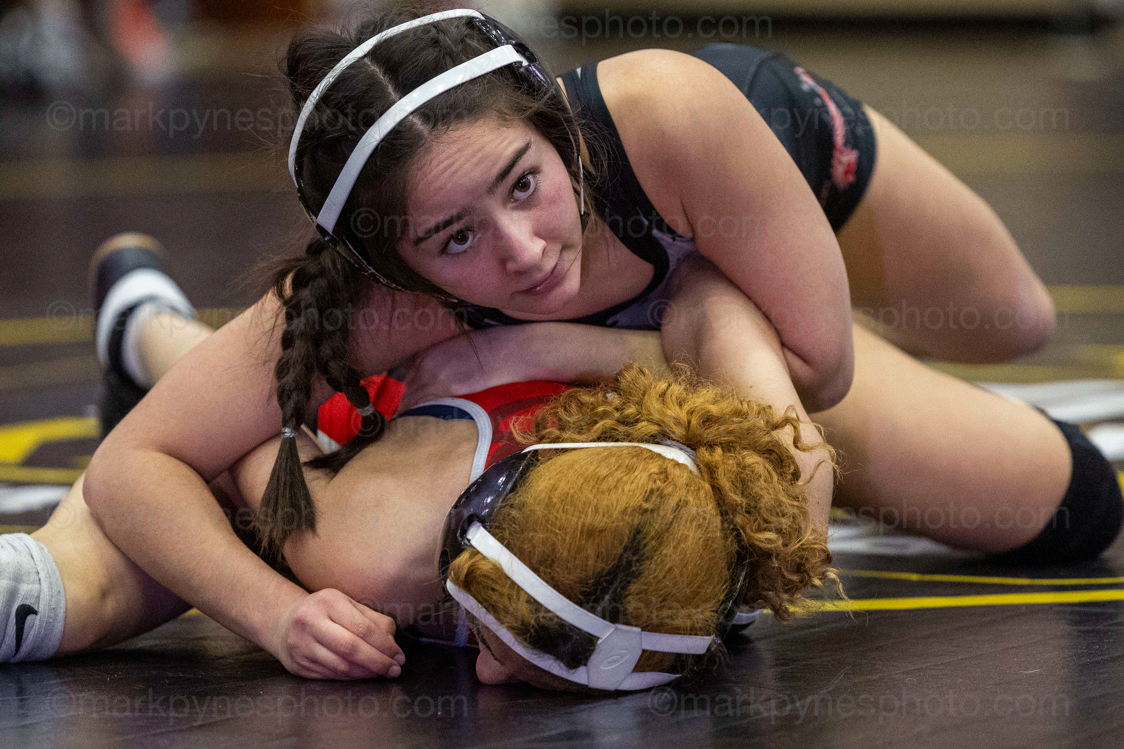 Ava Montes, Cumberland Valley, pins J.P. McCaskey’s Angelie Torres, in the 100-pound match.