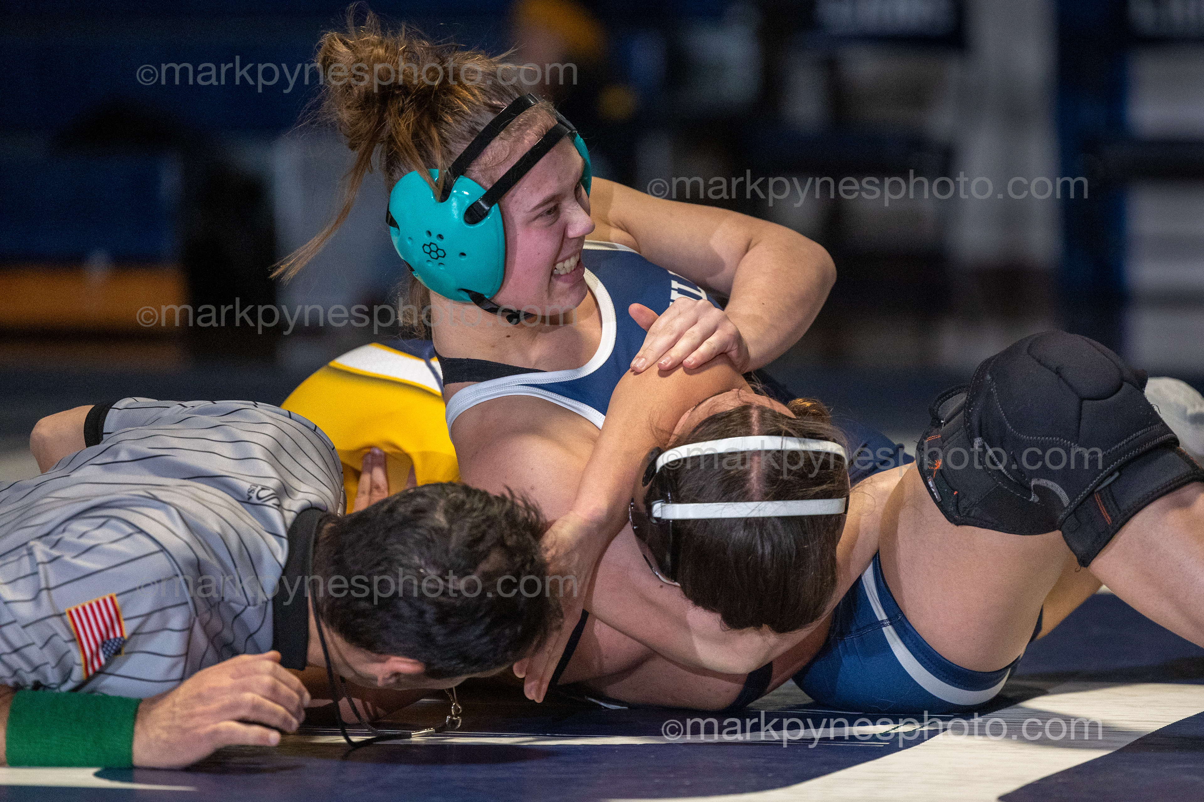 Emmalee Sabo, Camp Hill, pins Upper Perkioman’s Avery Holly, in 48 seconds.