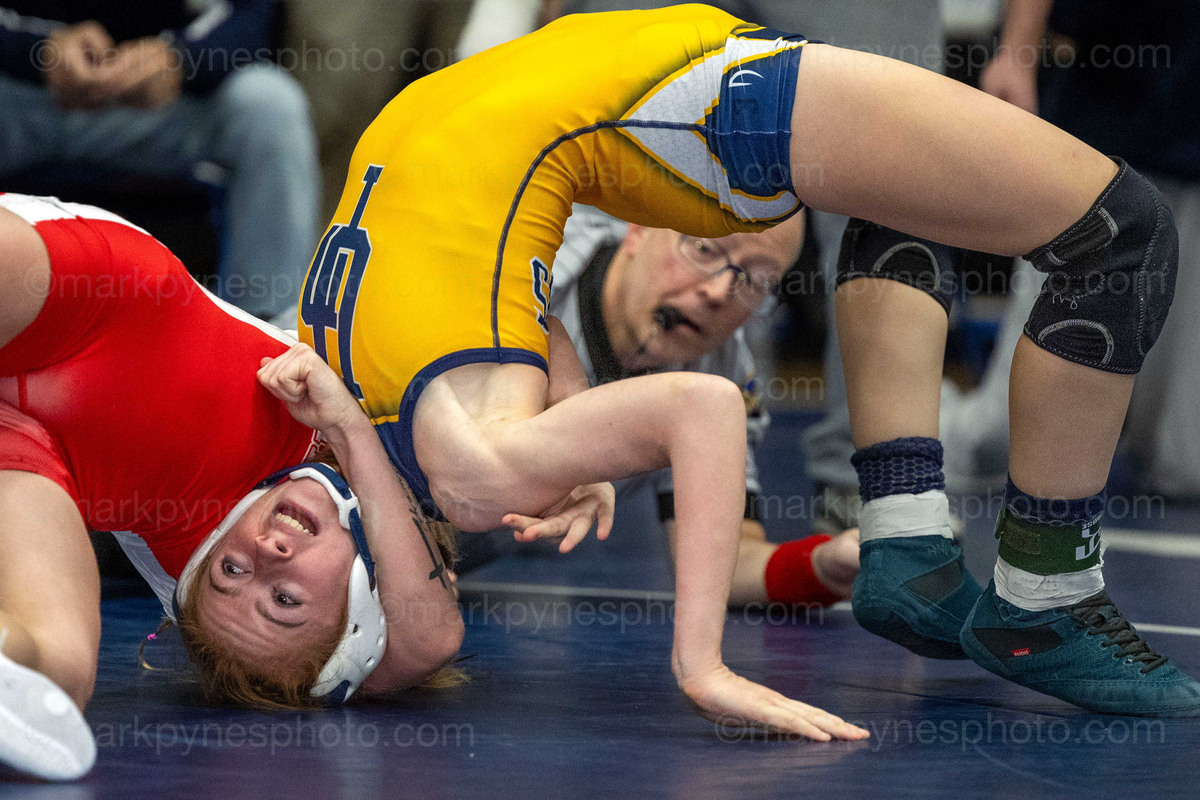 Alexandra Cannon, Upper Perkiomen, bridges out of a bad situation and goes on to pin Wilson’s Jocelyn Dietz, in the 112-pound final.